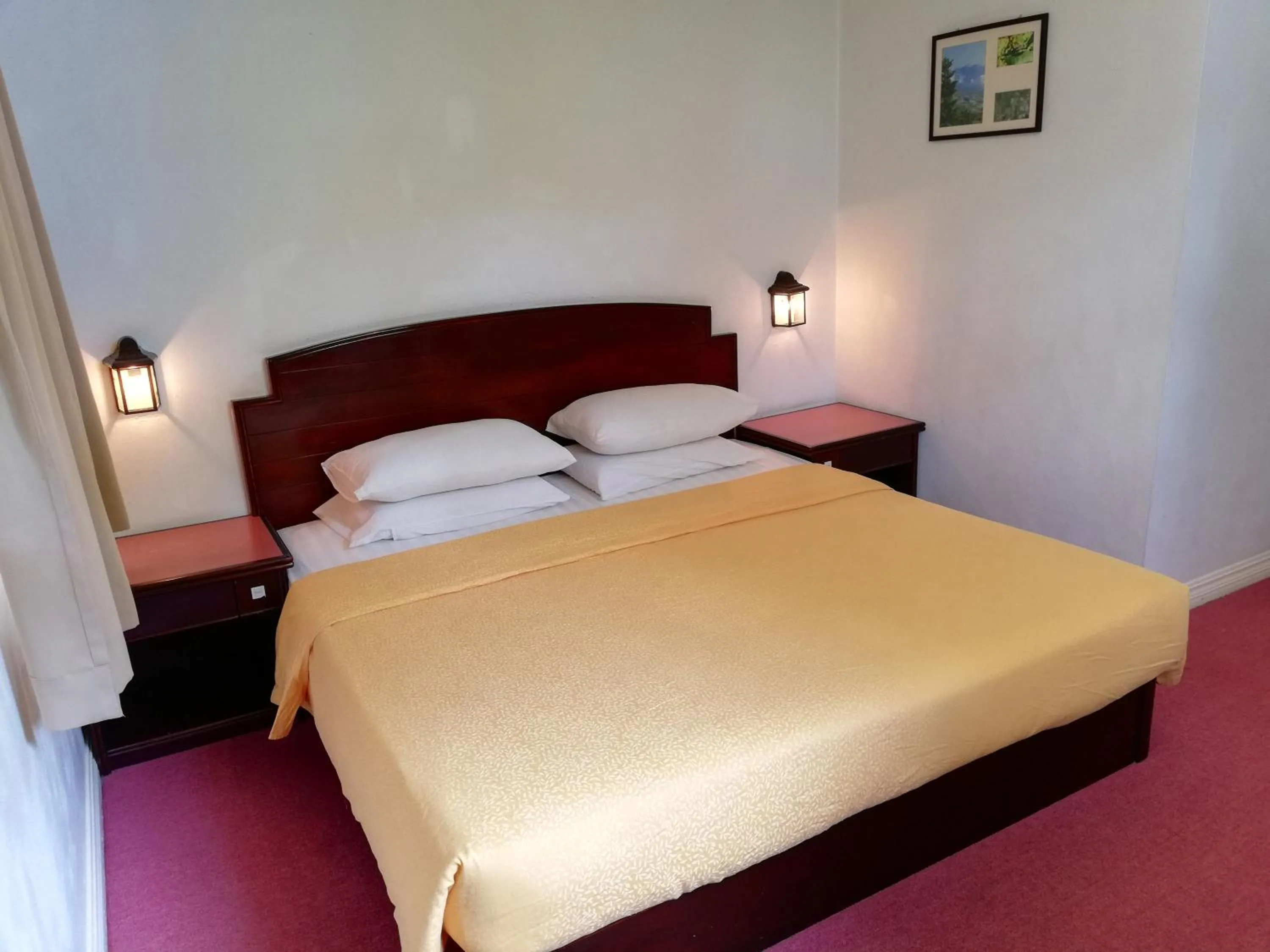 Bed in Kinabalu Pine Resort