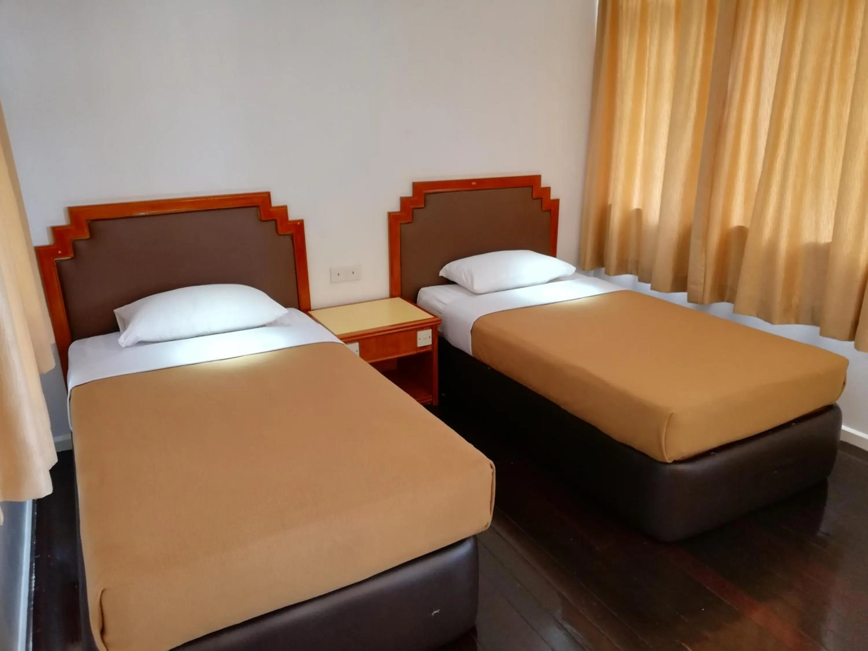 Bed in Kinabalu Pine Resort