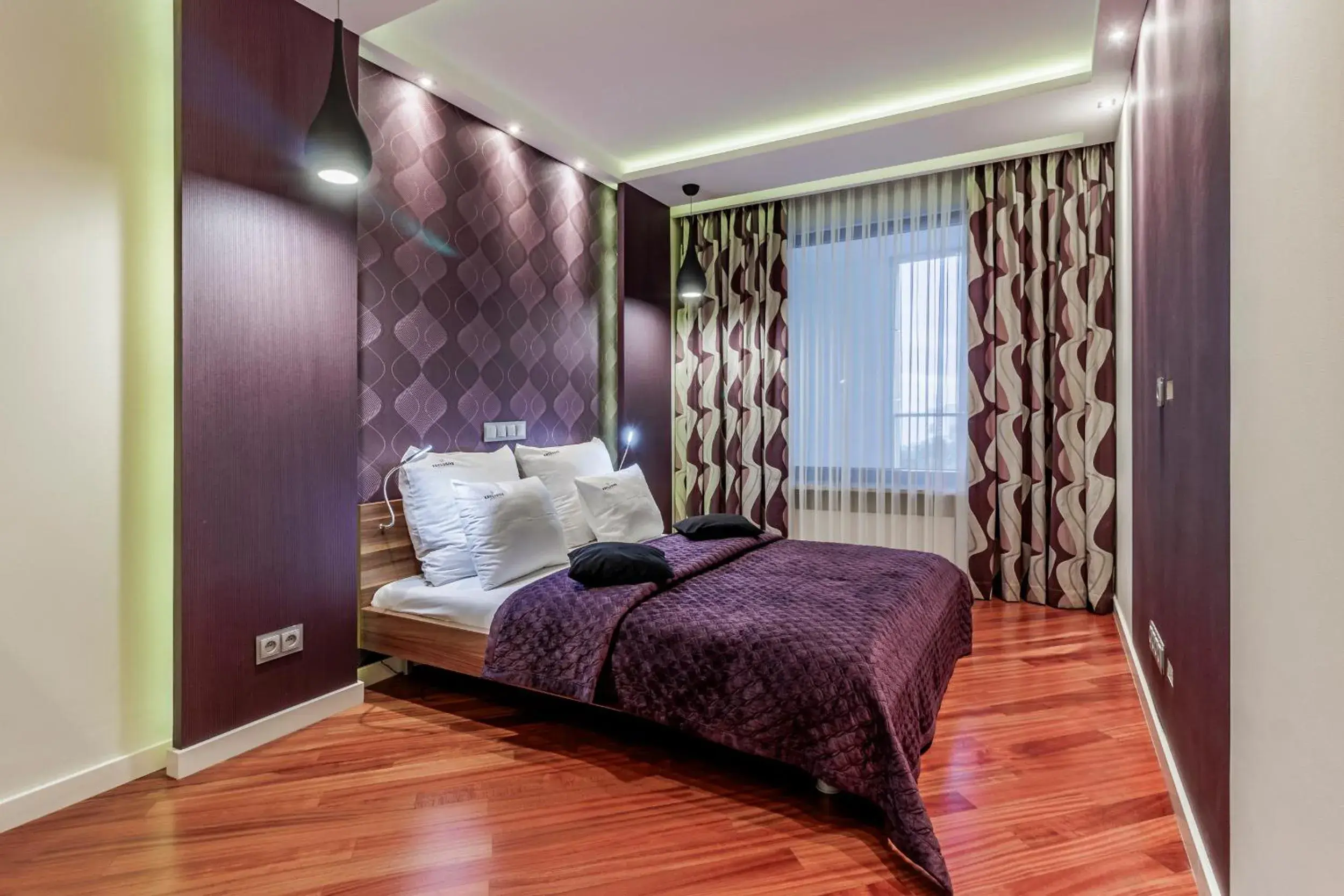 Bed in EXCLUSIVE Aparthotel Bed in EXCLUSIVE Aparthotel