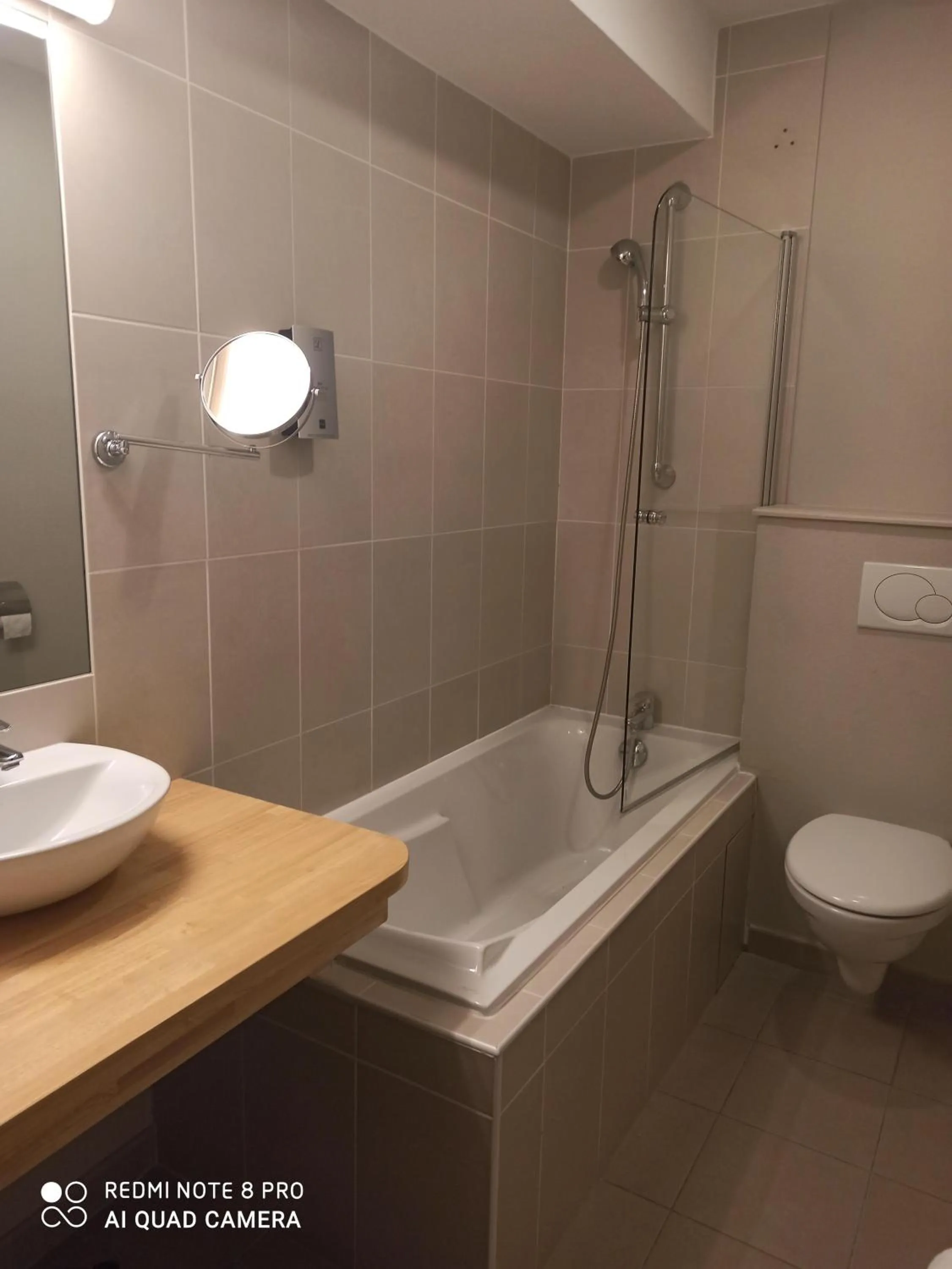 Toilet in Logis Hotel Le Nouvel