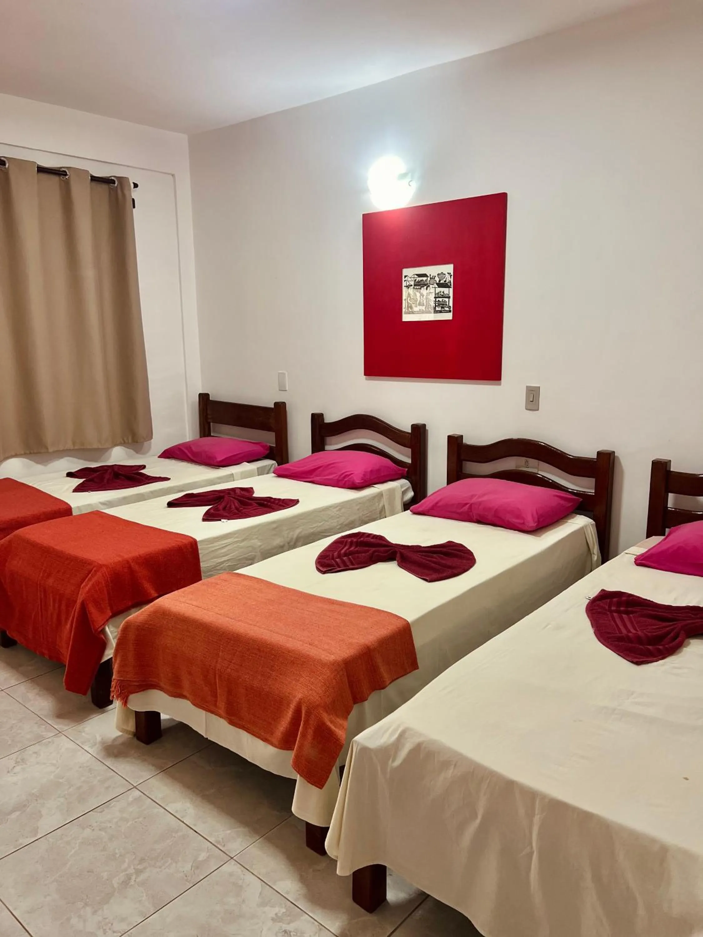 Bed in Pousada Costa Tropical