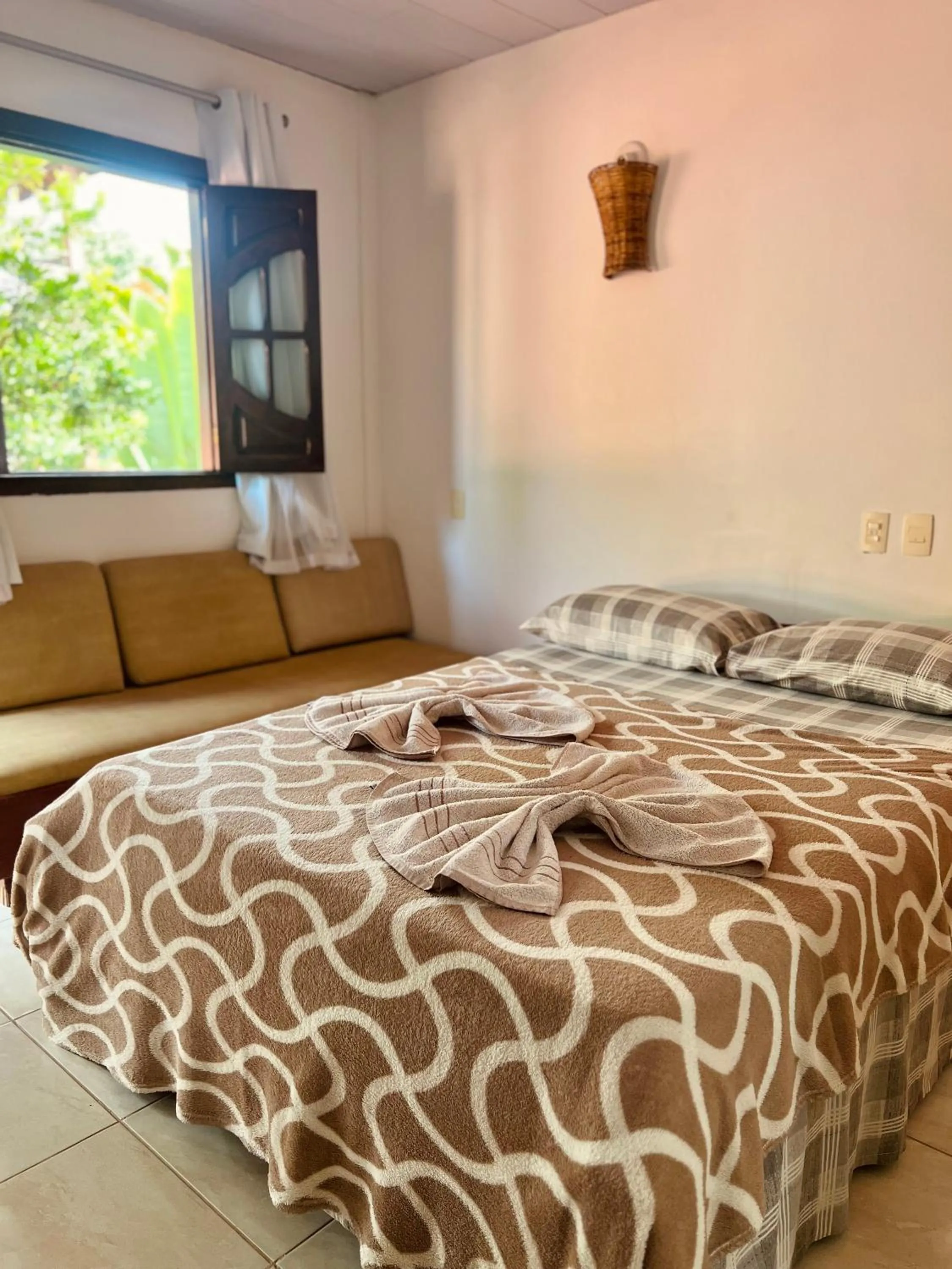 Bed in Pousada Costa Tropical