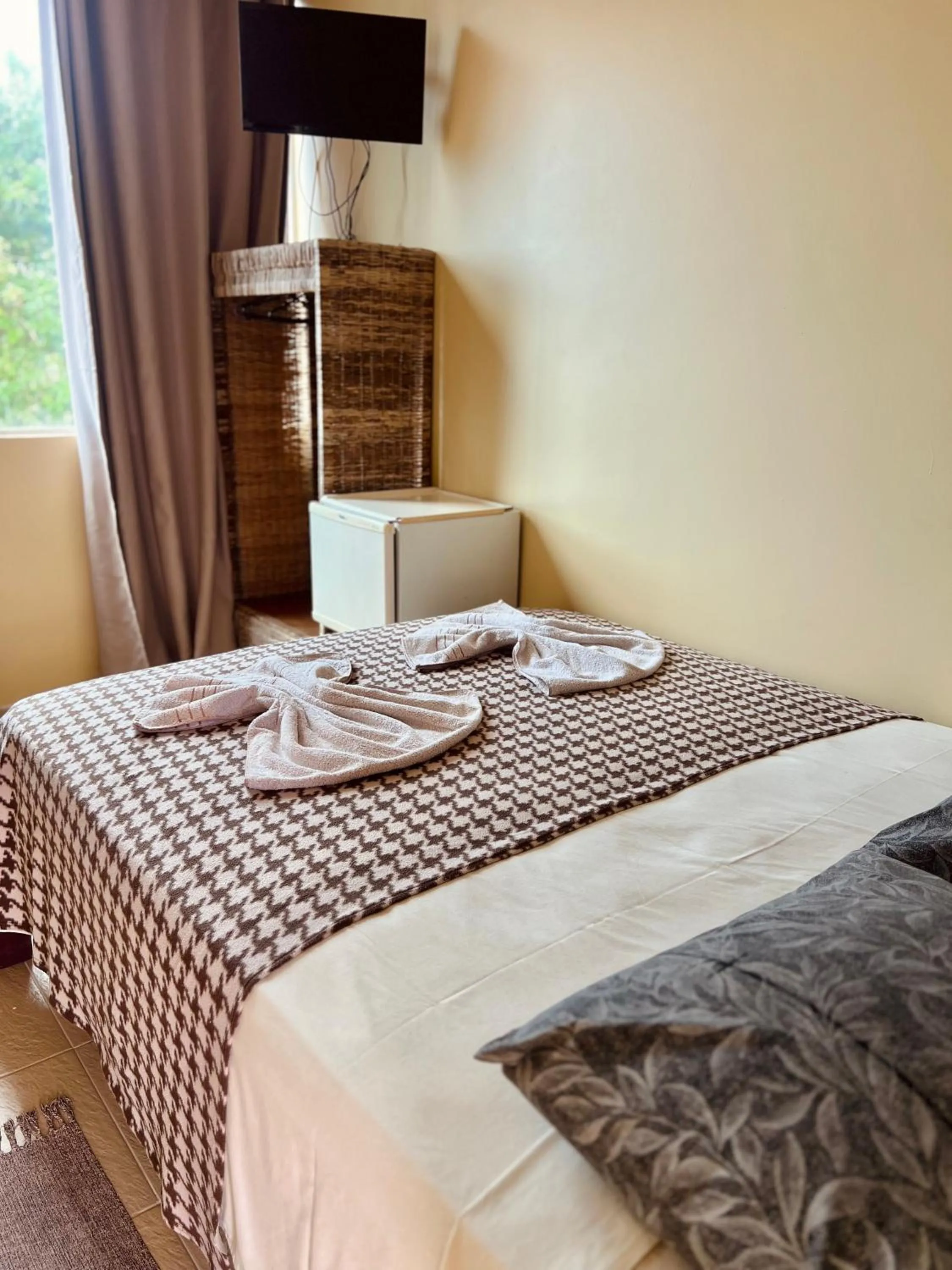 Bed in Pousada Costa Tropical