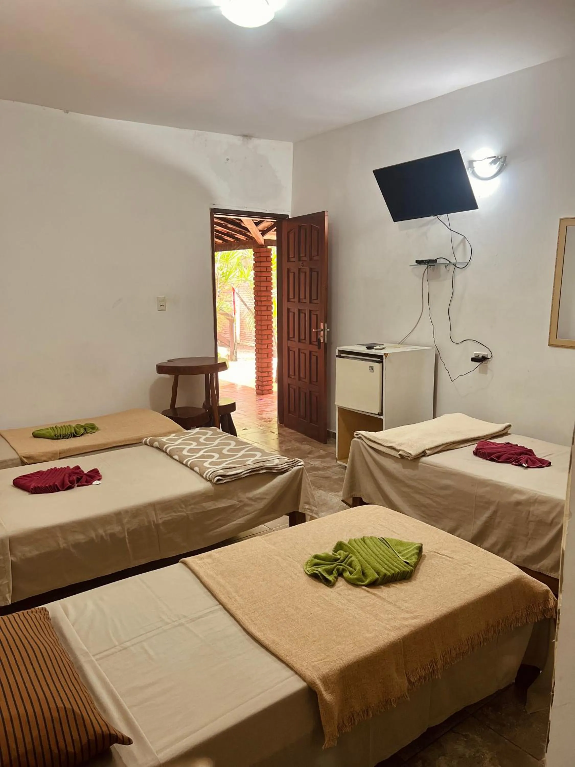 Bed in Pousada Costa Tropical