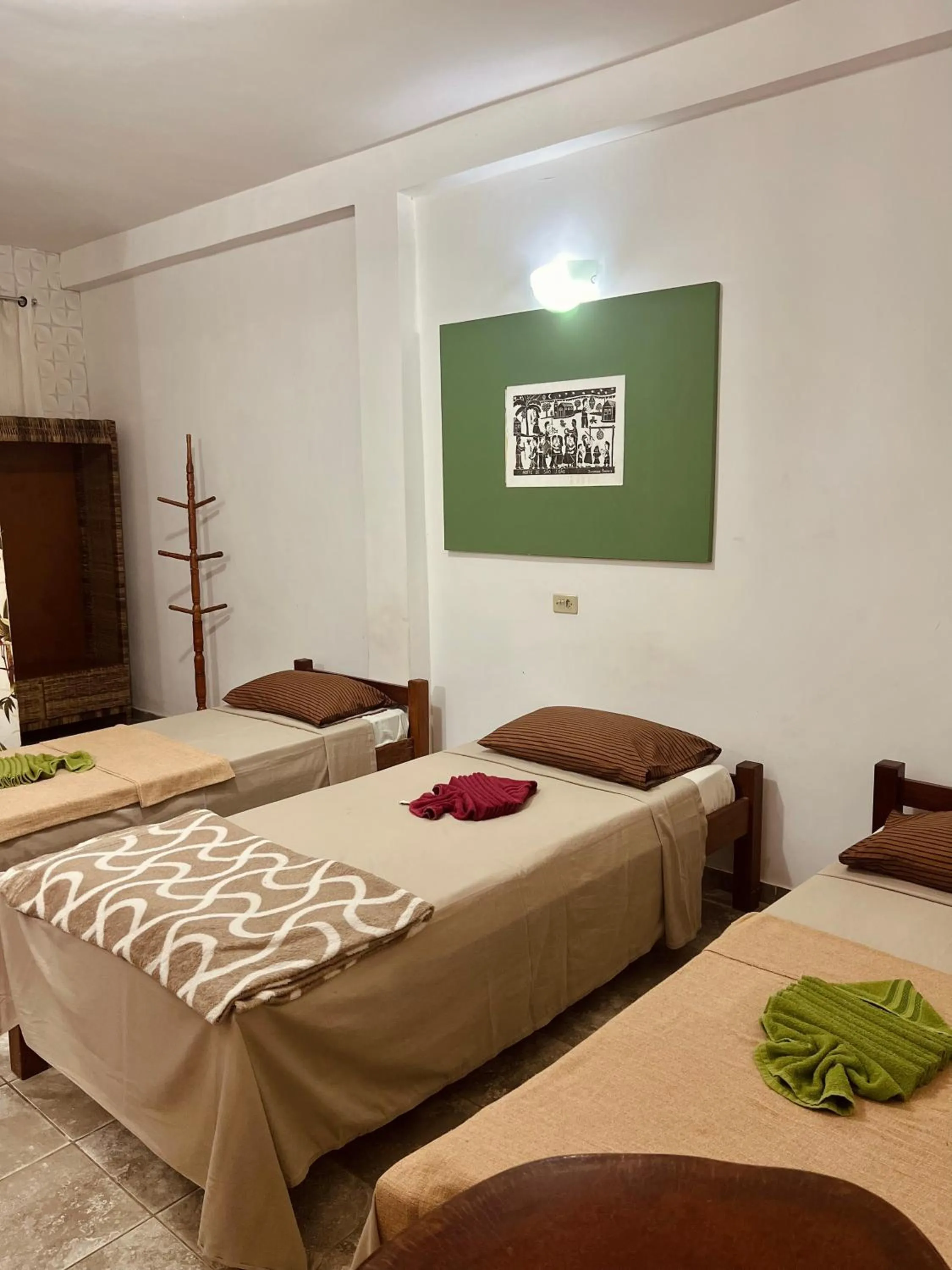 Bed in Pousada Costa Tropical