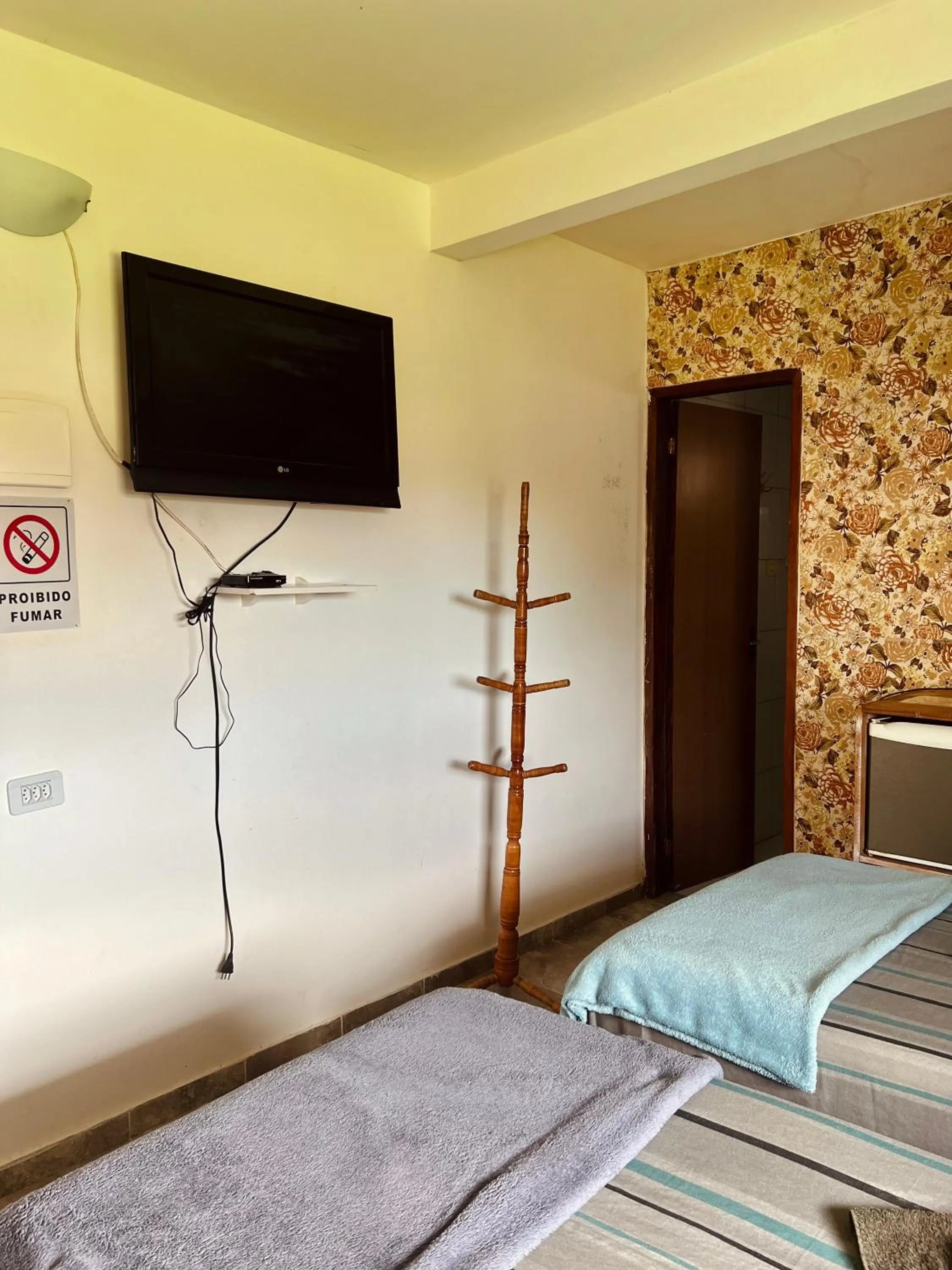 Bed in Pousada Costa Tropical