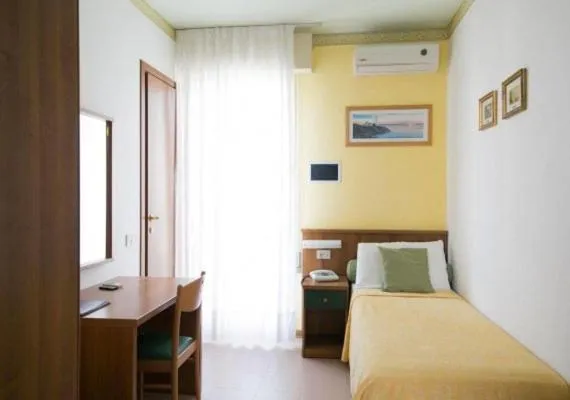 Bed in Hotel Righetto Fronte Mare