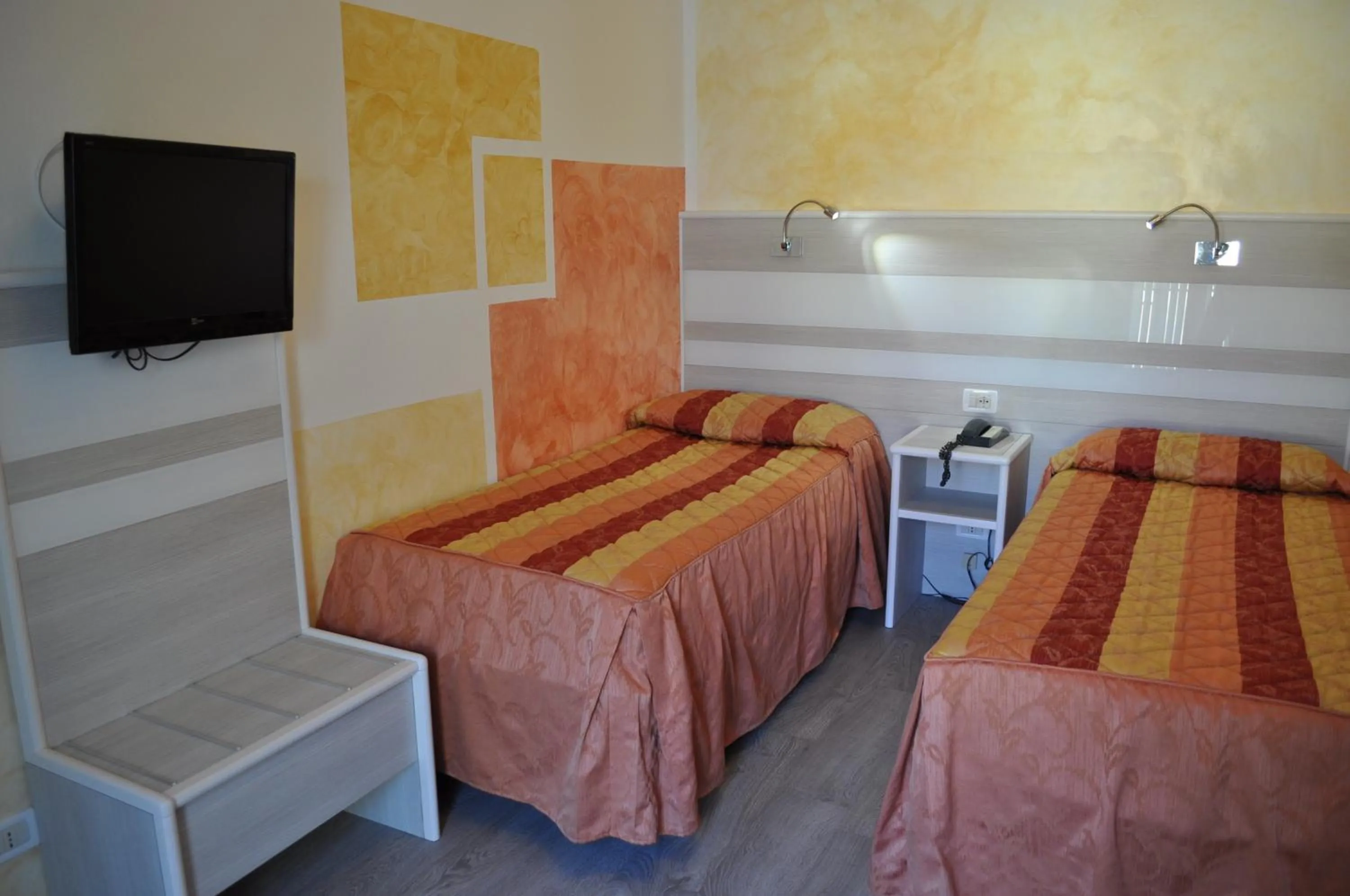 Bed in Hotel Righetto Fronte Mare