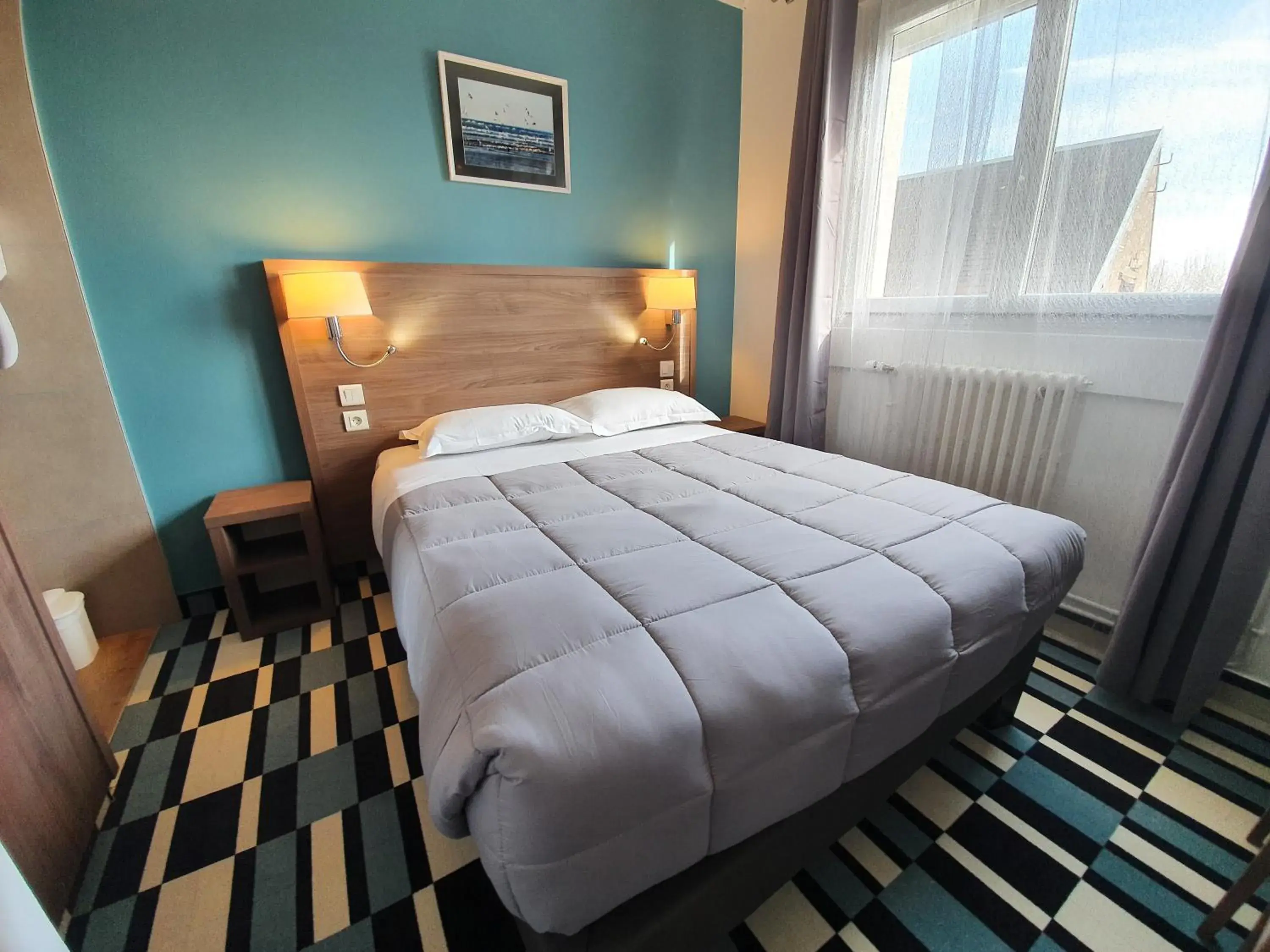 Bed in Hôtel Les Pieux En Cotentin