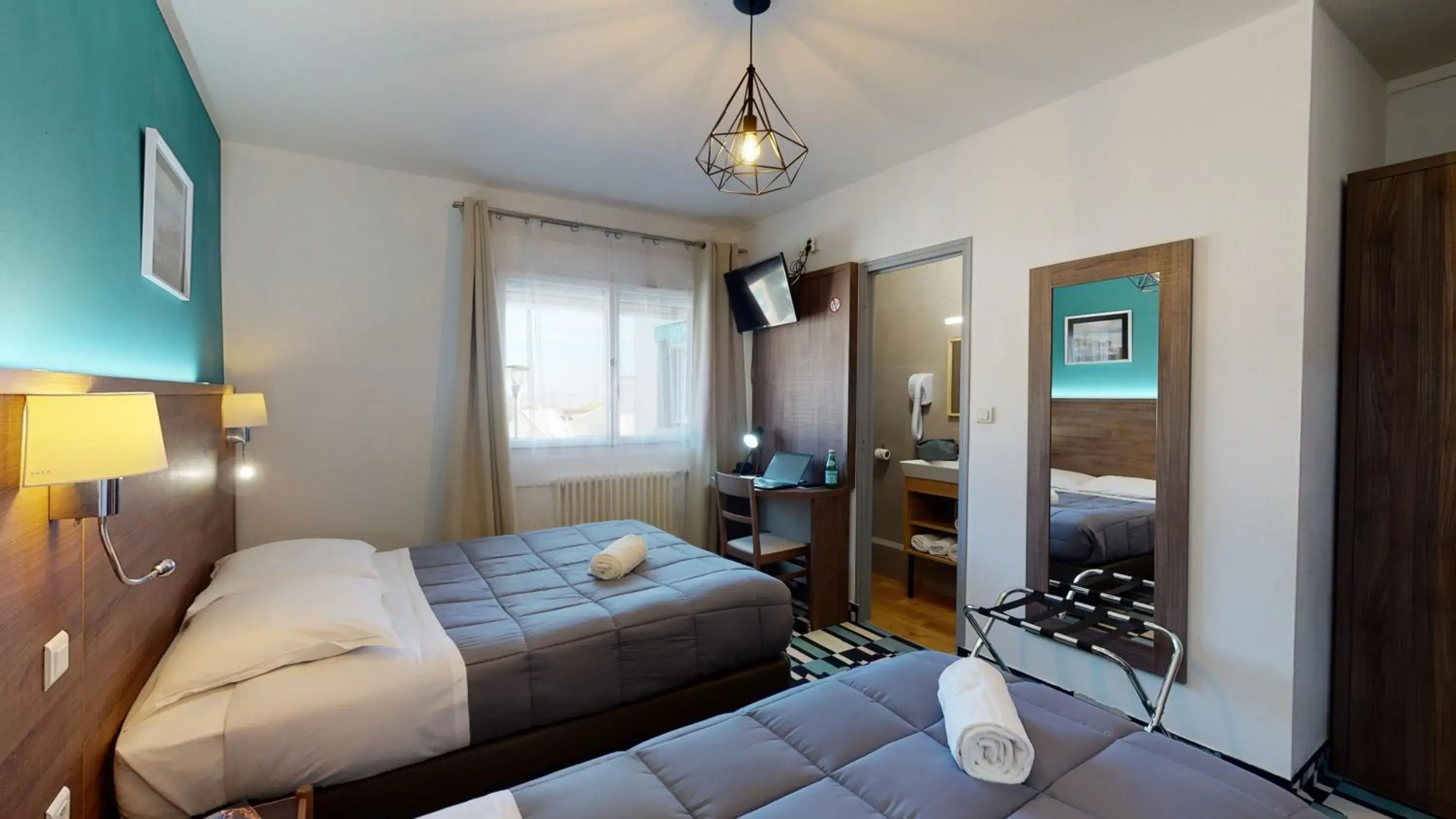 Photo of the whole room, Bed in Hôtel Les Pieux En Cotentin