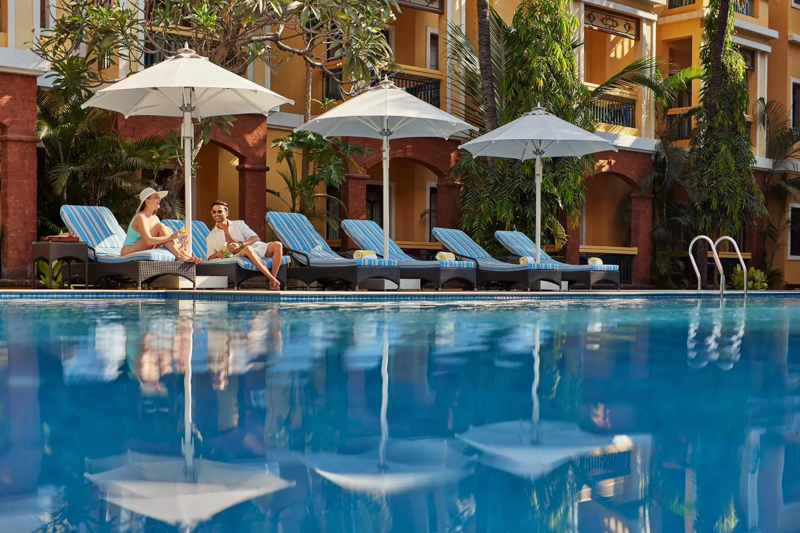 Swimming pool in La Estoria, Goa - IHCL SeleQtions Swimming pool in La Estoria, Goa - IHCL SeleQtions