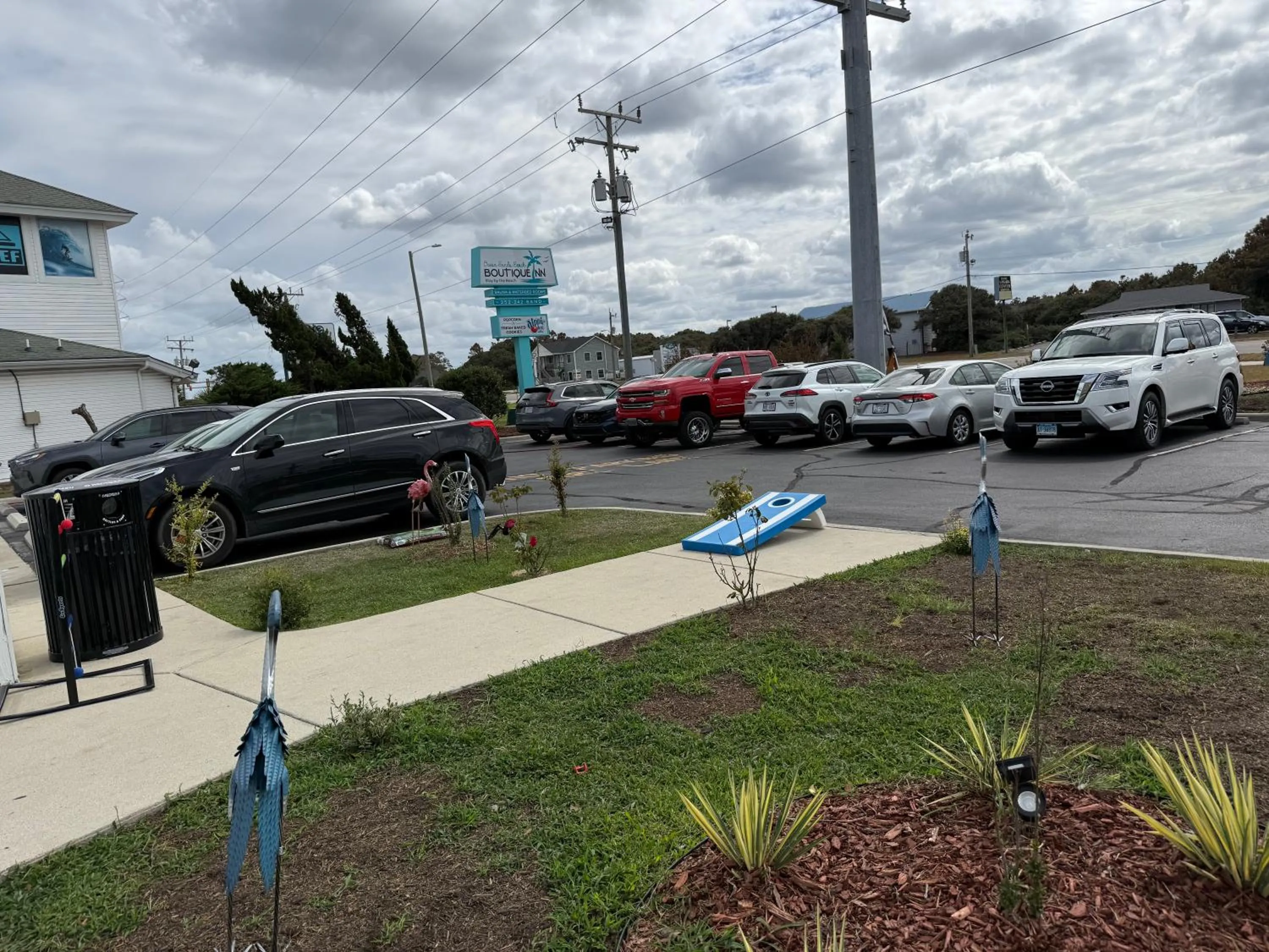 NEW 2026-Ocean Sands Beach Boutique Inn-Sauna and Salt-Mineral Pool -Free Beach Bikes and Famous Beach- Fresh Baked Cookies and Popcorn - Bathrobes and Sunscreen in all rooms-Ultra Sparkling-Free Laundry- 4 Grand Black Beds-Call NOW & Save-1-252-AHA-SAND