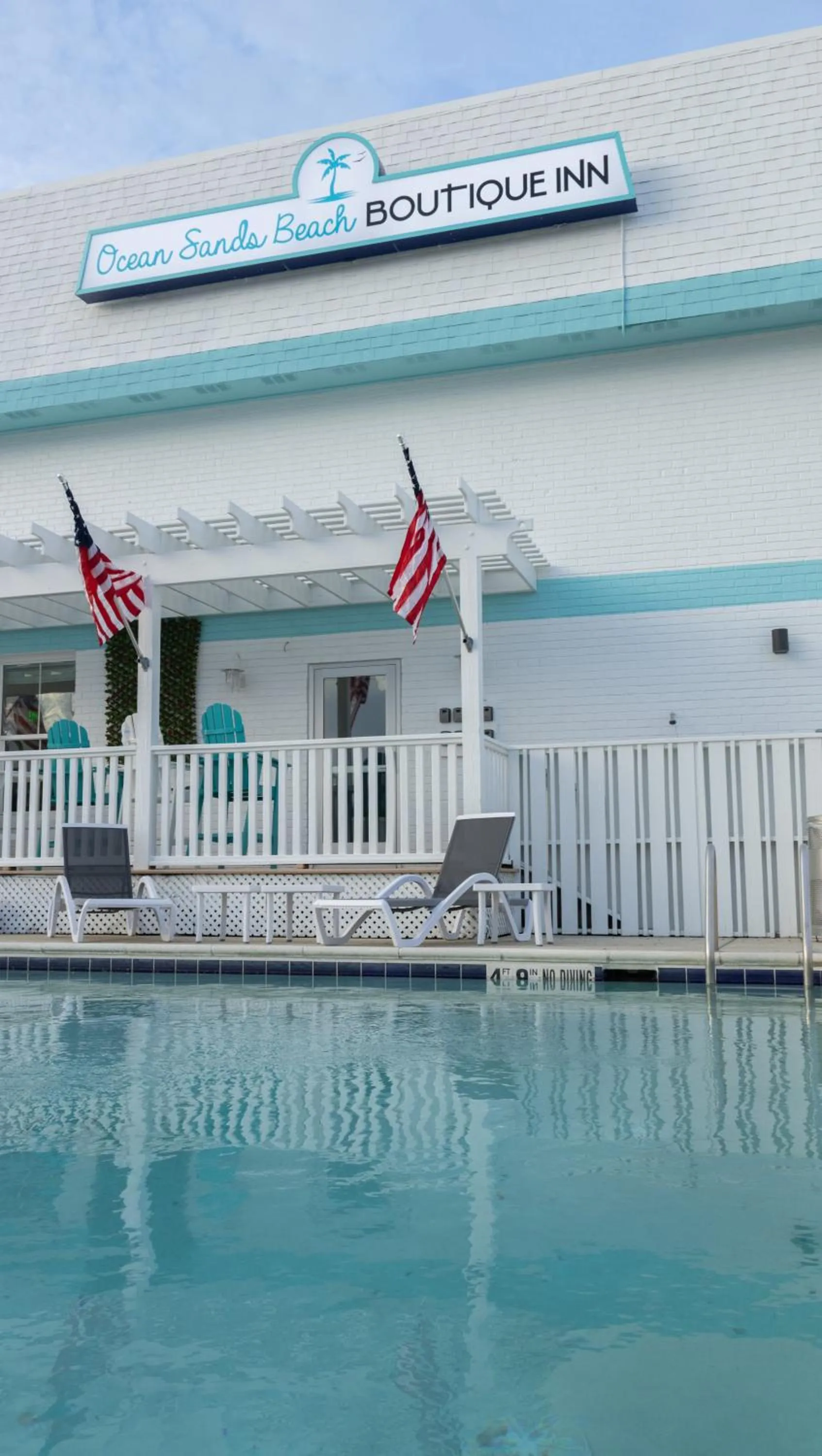 Swimming pool in NEW 2026-Ocean Sands Beach Boutique Inn-Sauna and Salt-Mineral Pool -Free Beach Bikes and Famous Beach- Fresh Baked Cookies and Popcorn - Bathrobes and Sunscreen in all rooms-Ultra Sparkling-Free Laundry- 4 Grand Black Beds-Call NOW & Save-1-252-AHA-SAND