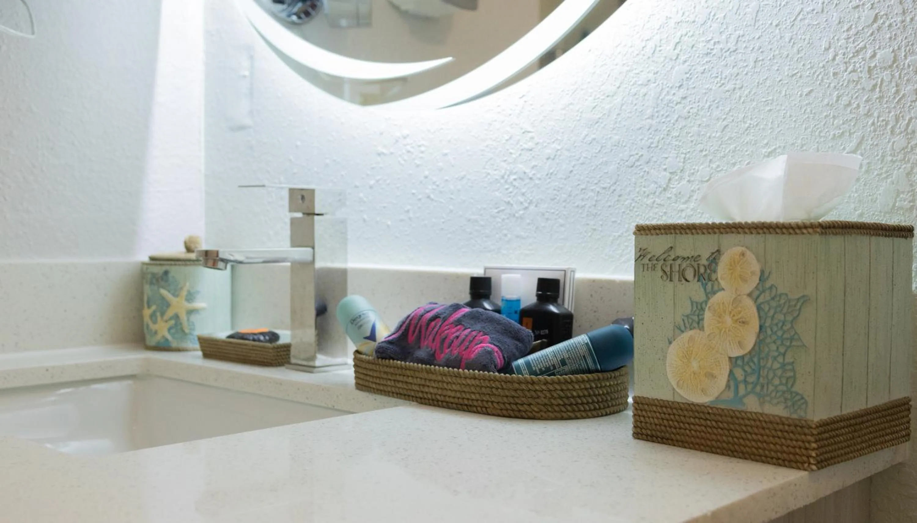 Bathroom in NEW 2026-Ocean Sands Beach Boutique Inn-Sauna and Salt-Mineral Pool -Free Beach Bikes and Famous Beach- Fresh Baked Cookies and Popcorn - Bathrobes and Sunscreen in all rooms-Ultra Sparkling-Free Laundry- 4 Grand Black Beds-Call NOW & Save-1-252-AHA-SAND