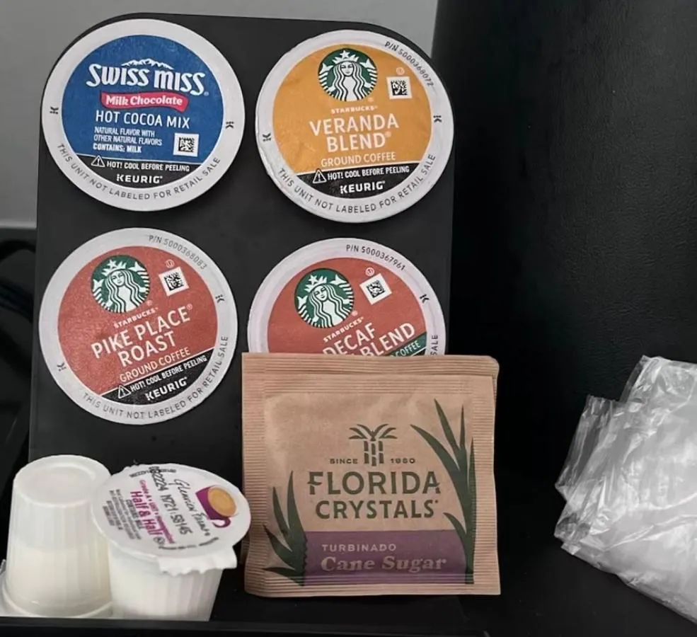 Coffee/tea facilities in NEW 2026-Ocean Sands Beach Boutique Inn-Sauna and Salt-Mineral Pool -Free Beach Bikes and Famous Beach- Fresh Baked Cookies and Popcorn - Bathrobes and Sunscreen in all rooms-Ultra Sparkling-Free Laundry- 4 Grand Black Beds-Call NOW & Save-1-252-AHA-SAND