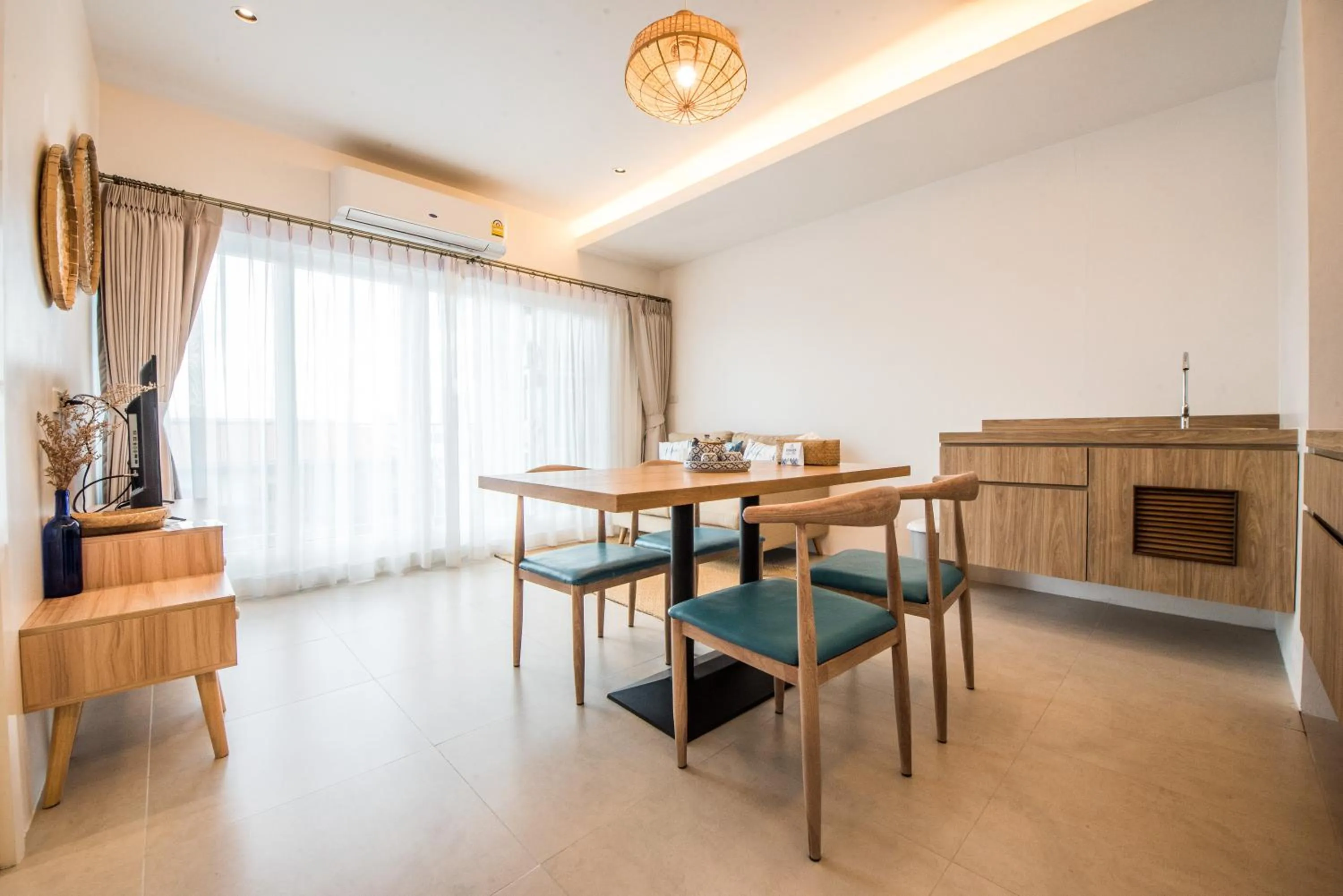 Living room in DeeProm Pattaya Hotel