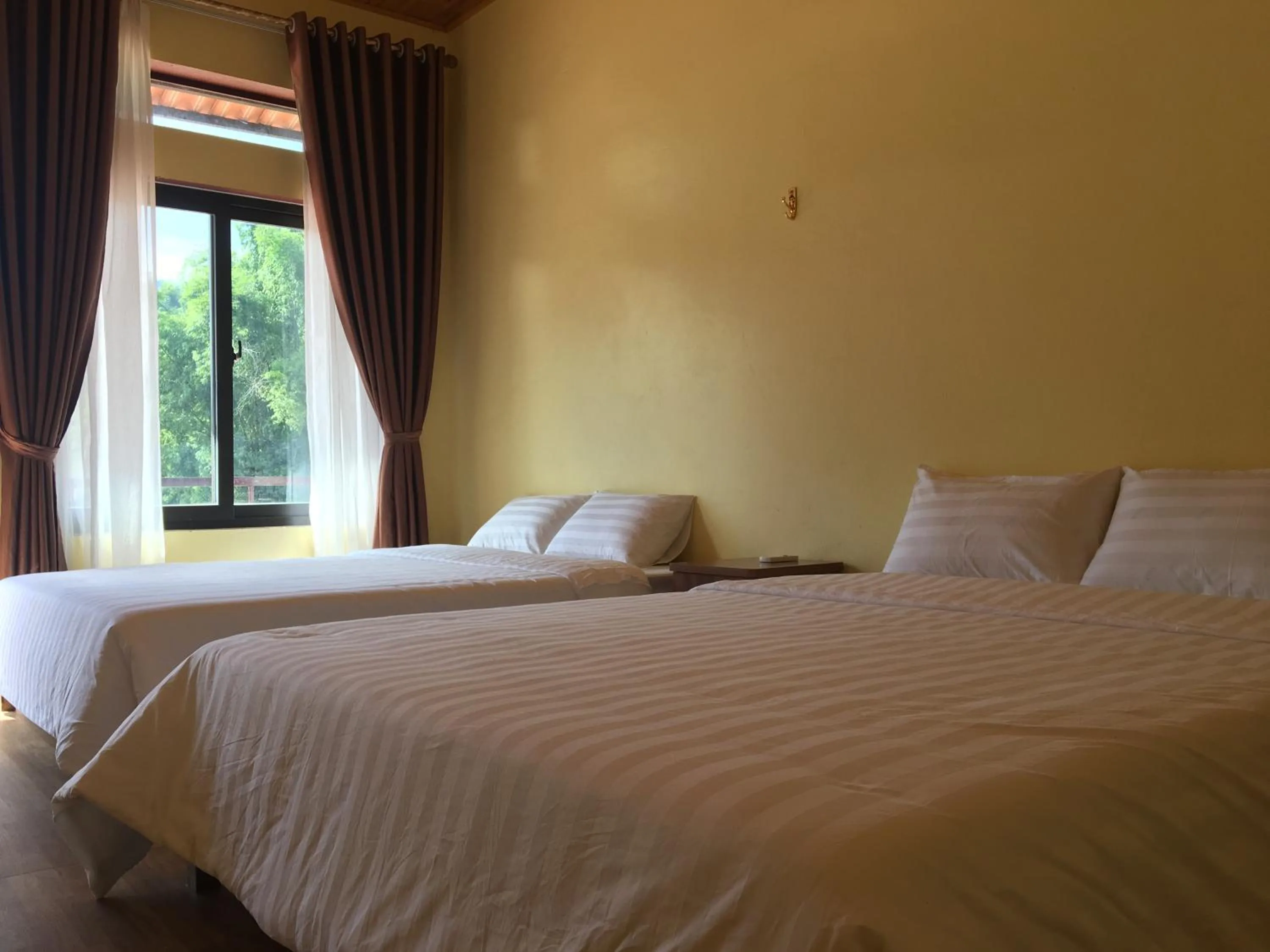 Bed in Mai Chau Xanh Bungalow