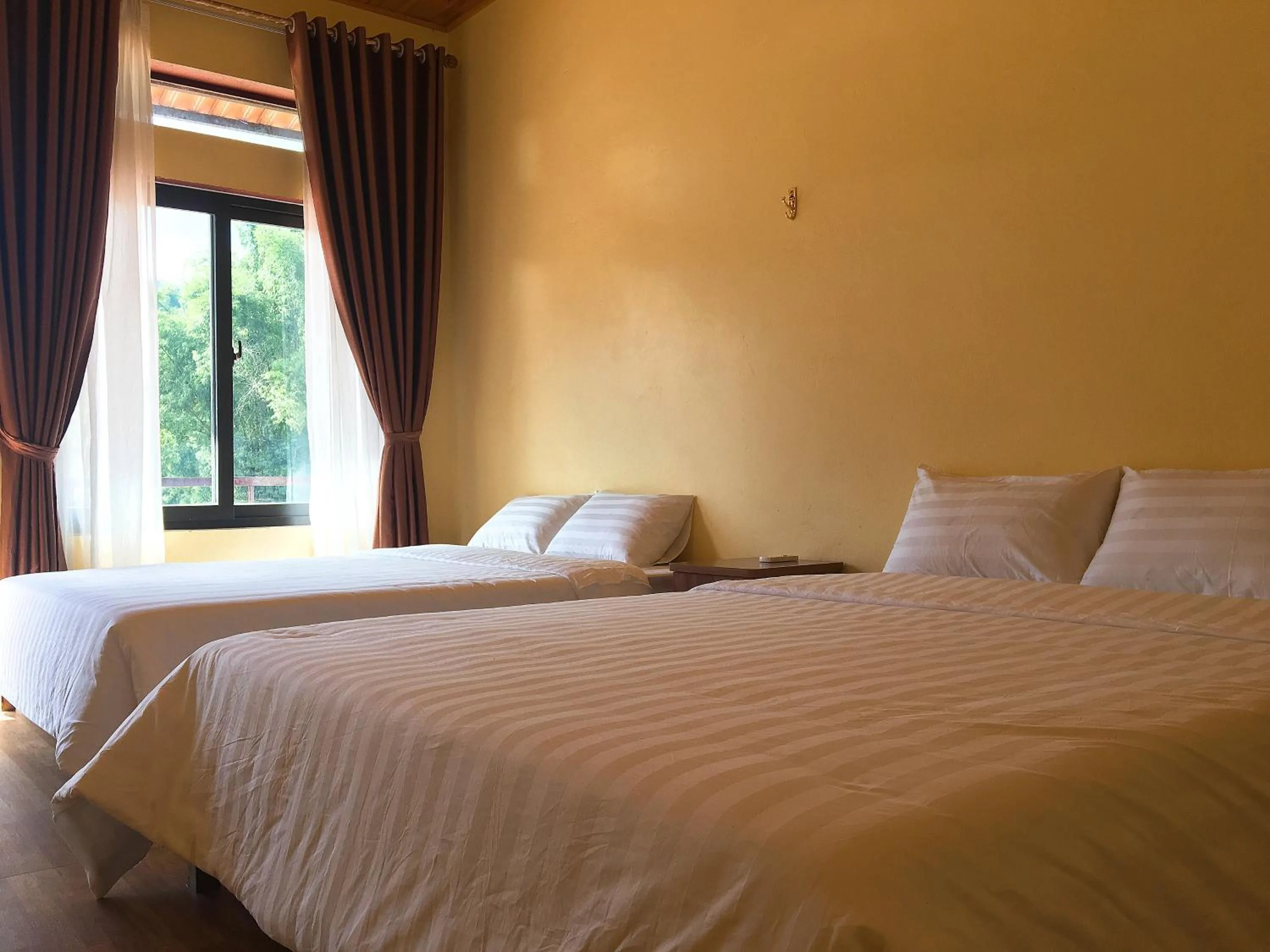 Bed in Mai Chau Xanh Bungalow