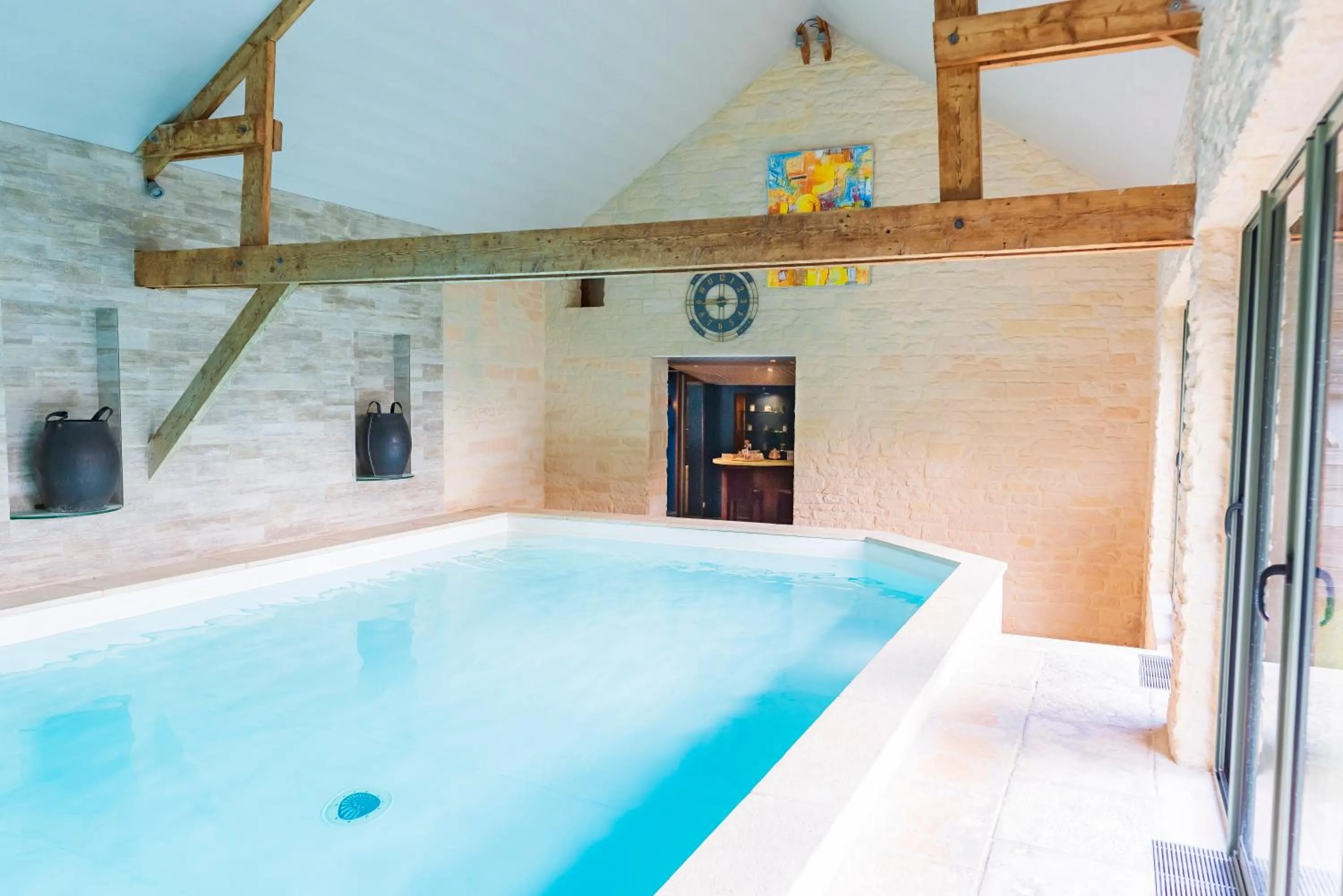 Swimming pool in Chambres d'Hôtes et Suites à La Ferme de l'Oudon & SPA