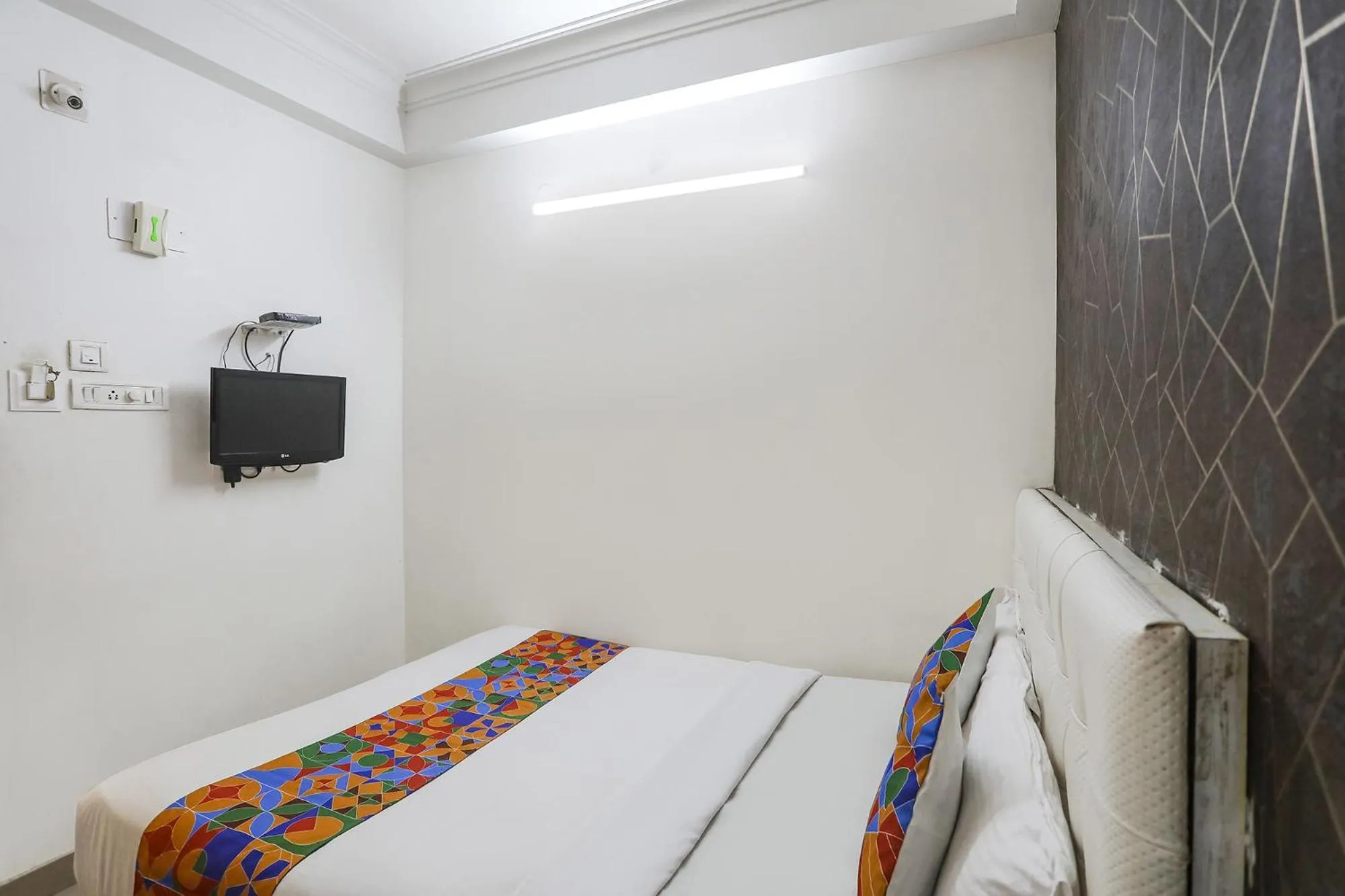 Bed in FabHotel Greenstar Inn - Bhubaneswar Airport