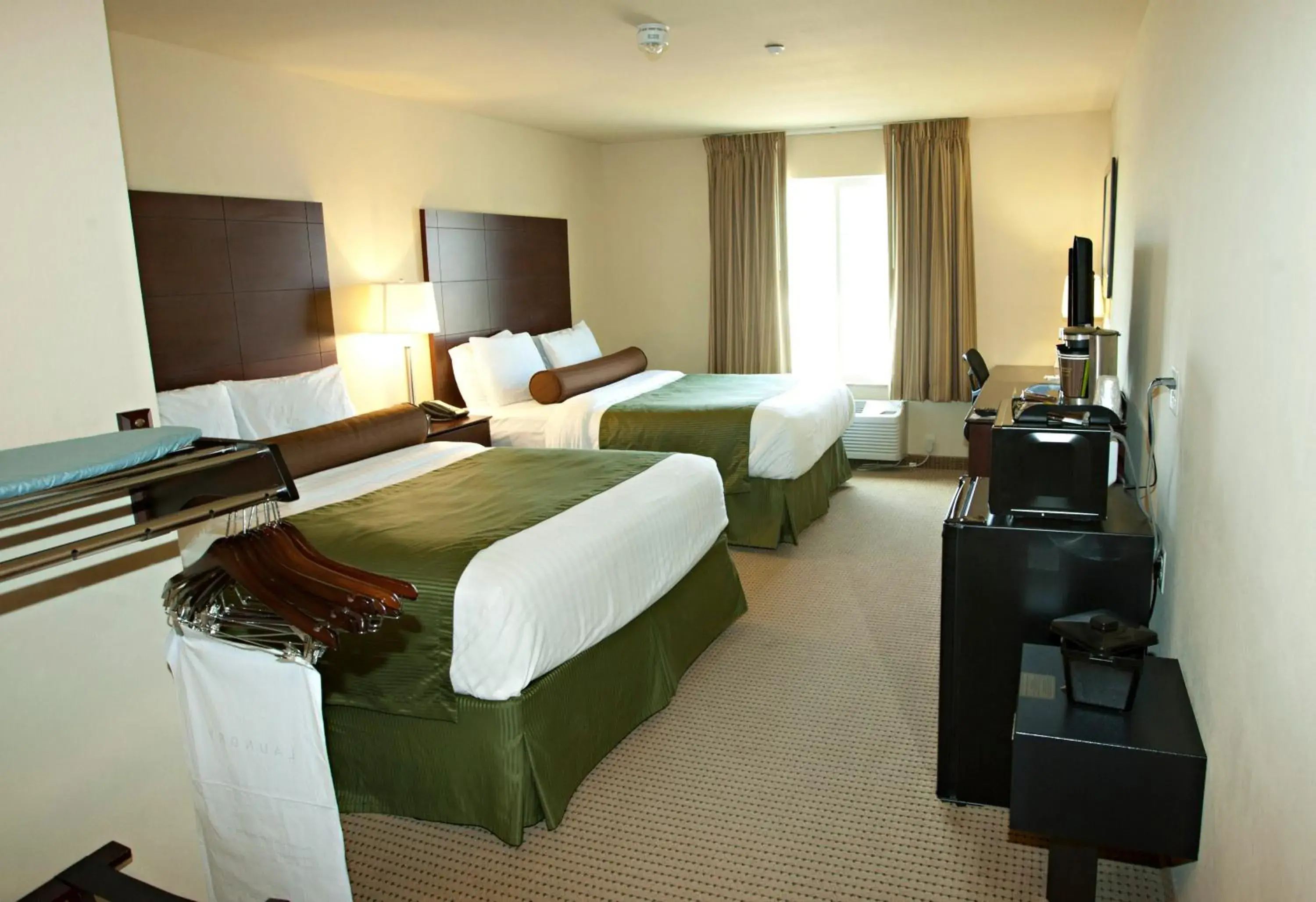 Bedroom, Bed in Cobblestone Inn & Suites - Langdon Bedroom, Bed in Cobblestone Inn & Suites - Langdon