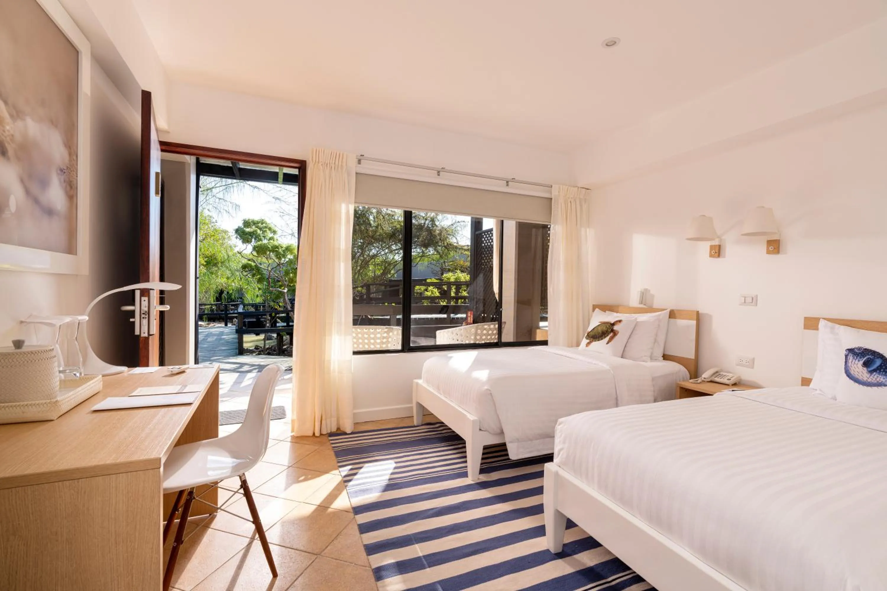 Photo of the whole room, Bed in Finch Bay Galapagos Hotel