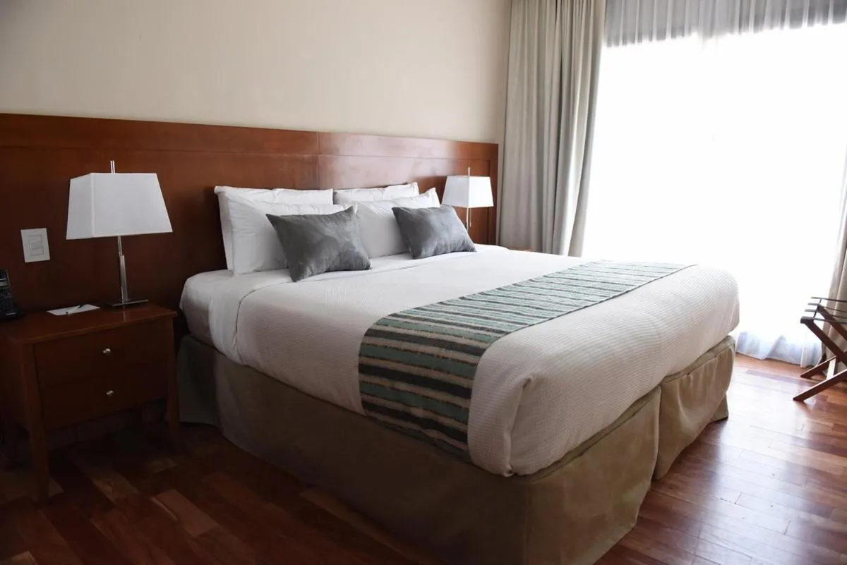 Photo of the whole room, Bed in Howard Johnson Resort & Spa Escobar