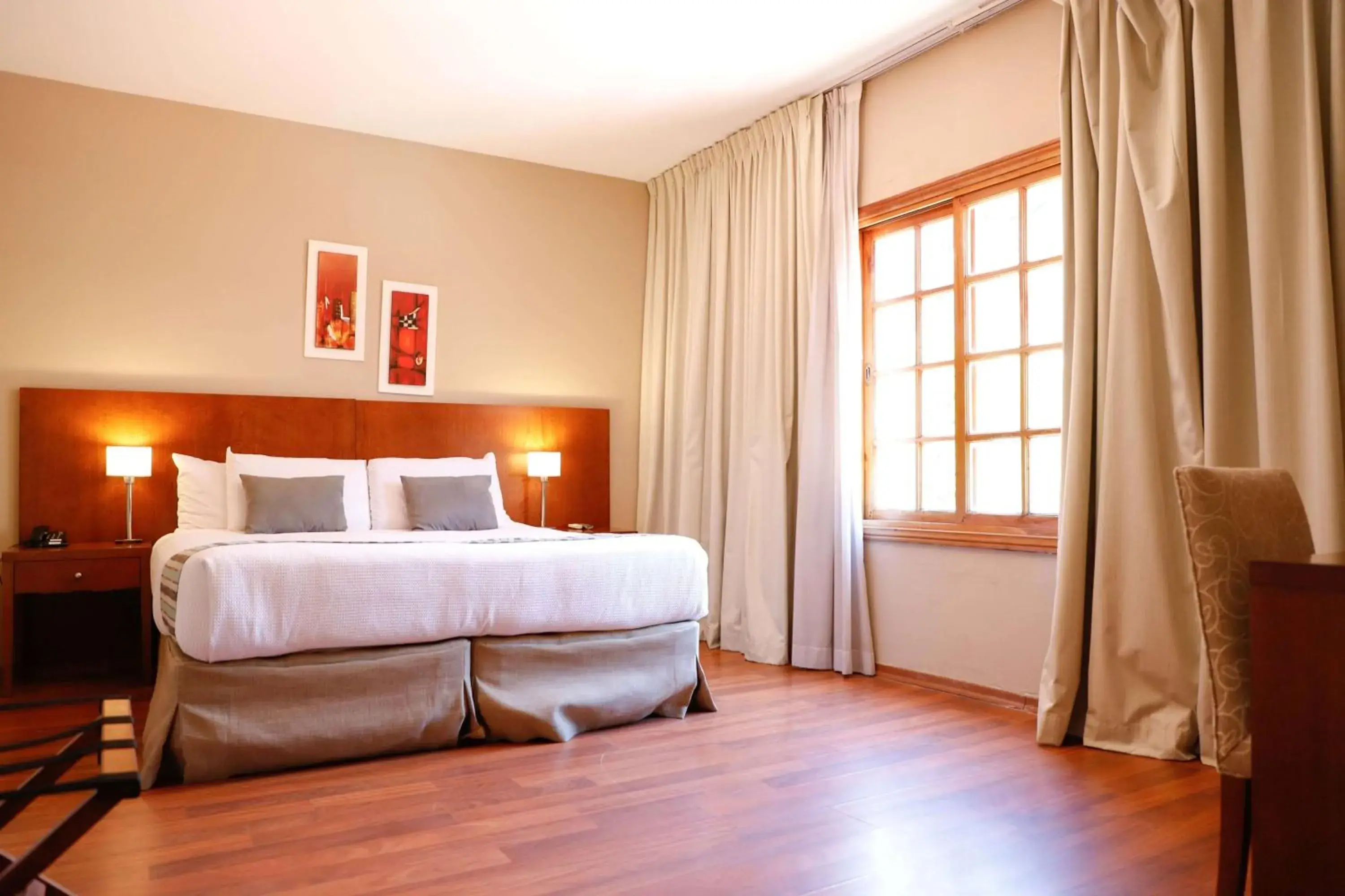 Photo of the whole room, Bed in Howard Johnson Resort & Spa Escobar Photo of the whole room, Bed in Howard Johnson Resort & Spa Escobar