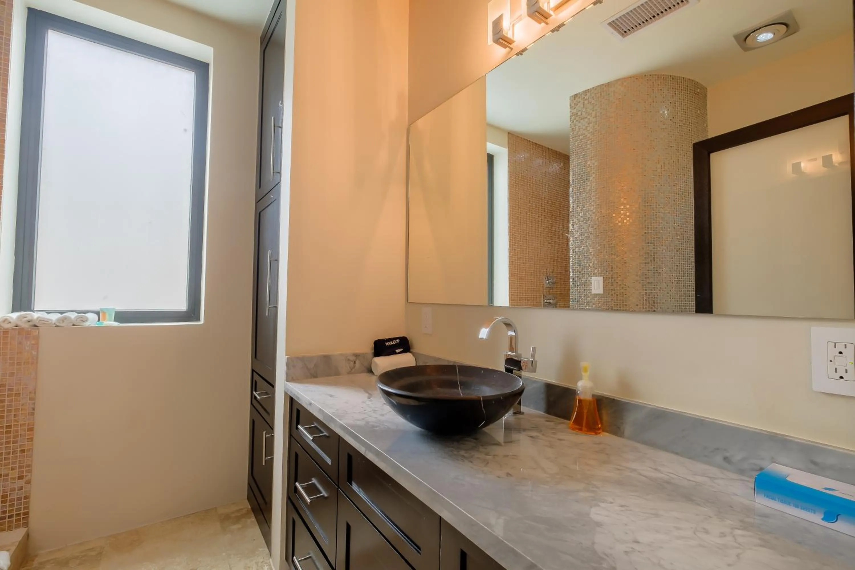 Bathroom in Diamante Beachfront Suites