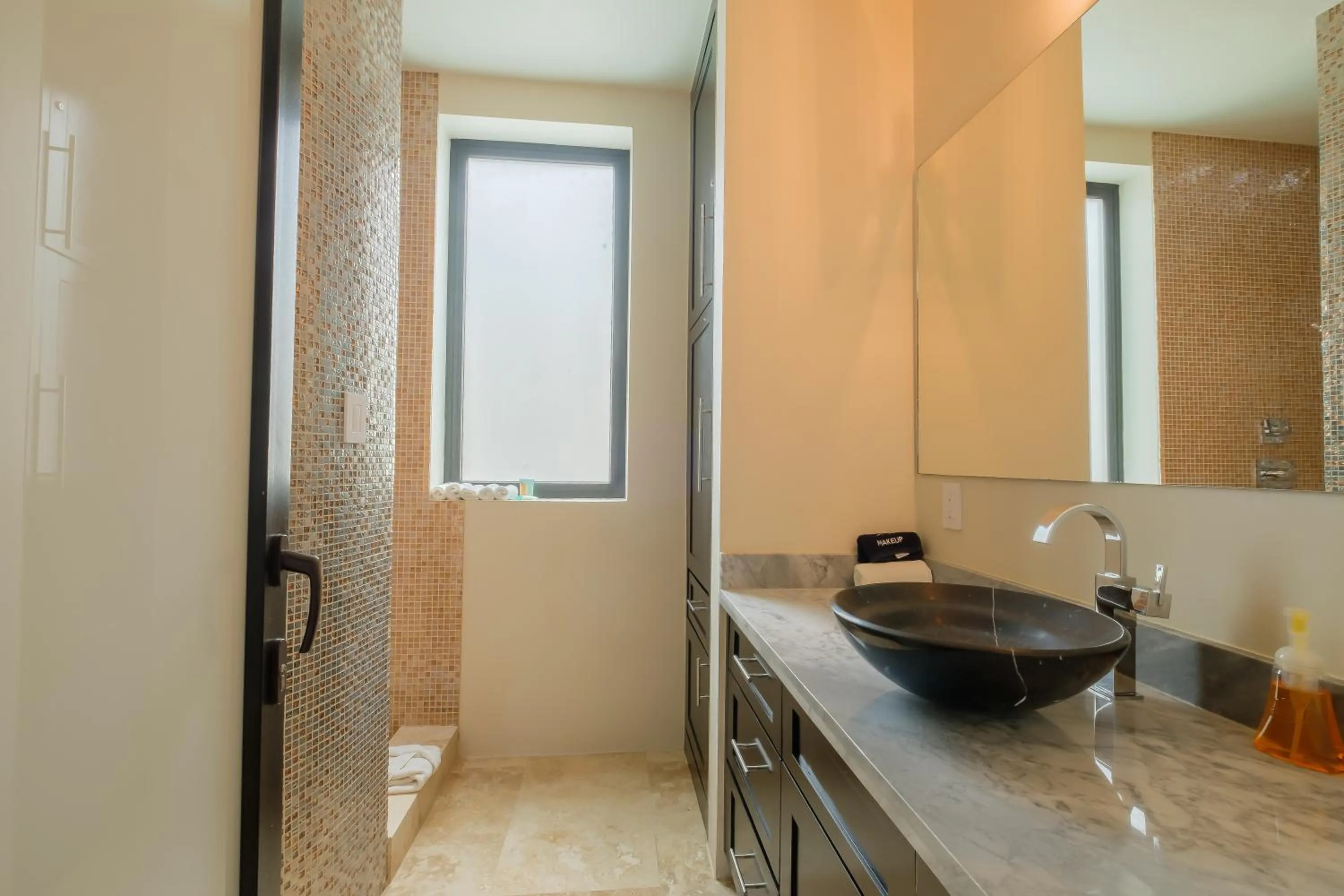 Bathroom in Diamante Beachfront Suites