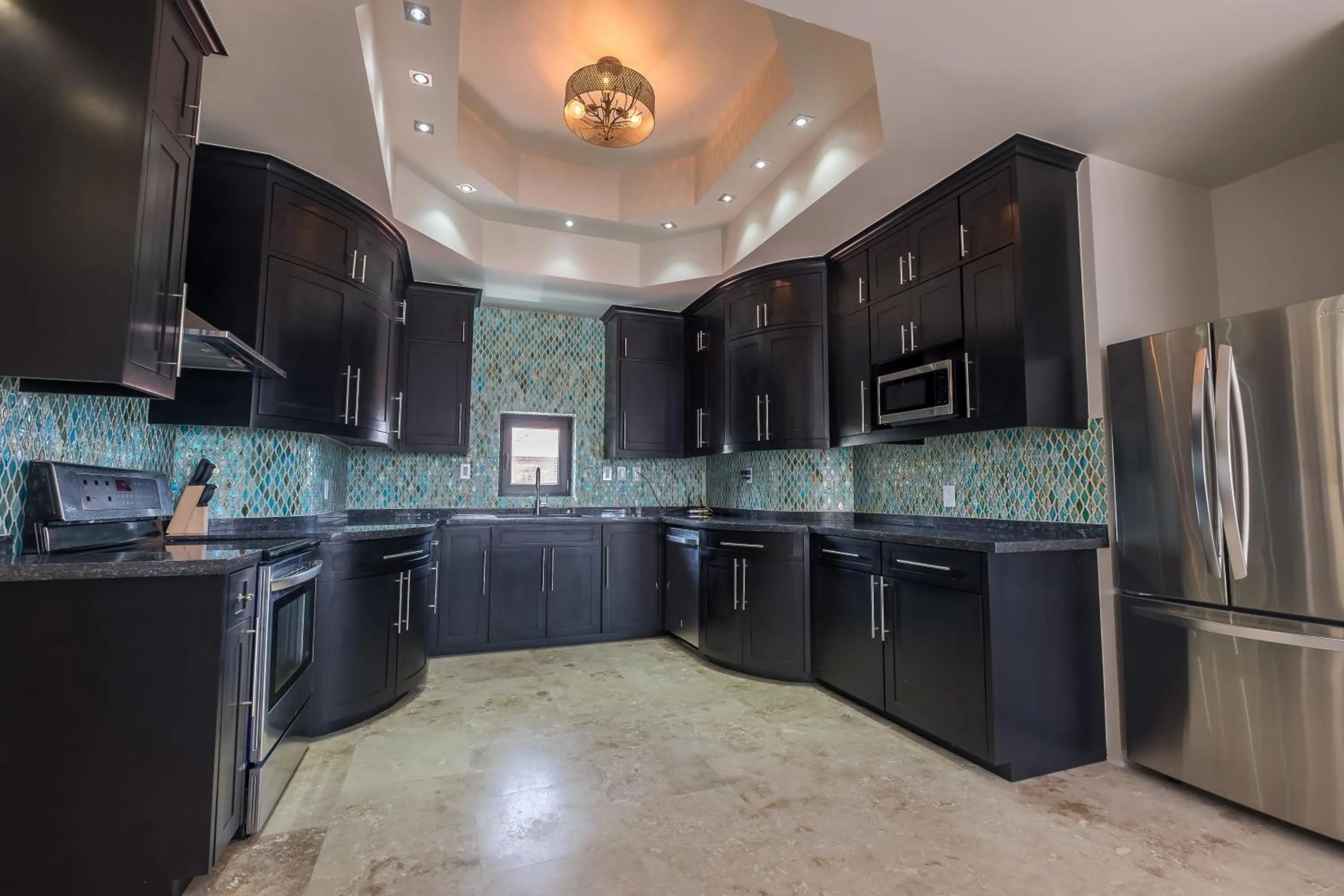 Kitchen or kitchenette in Diamante Beachfront Suites