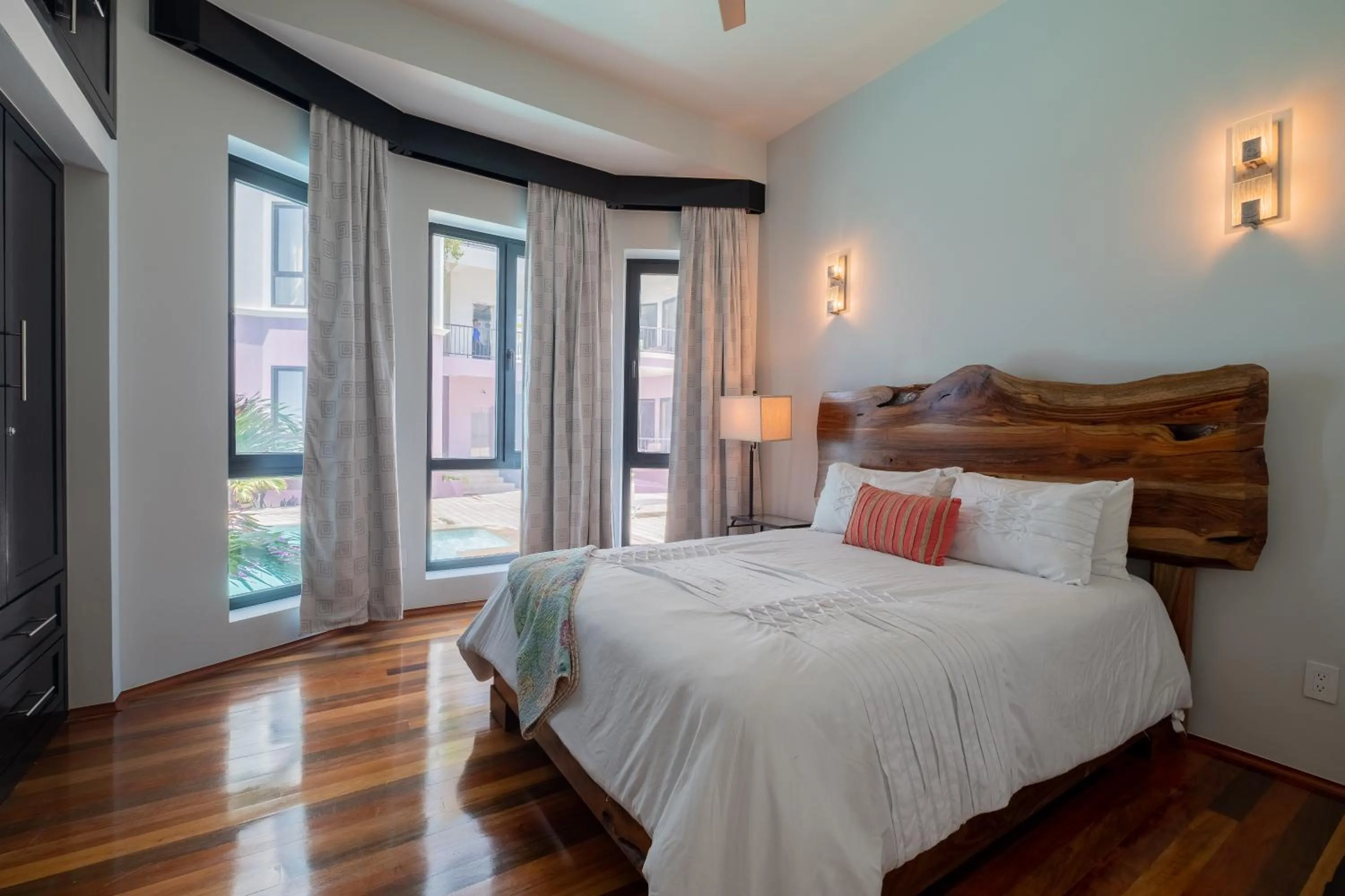 Bed in Diamante Beachfront Suites