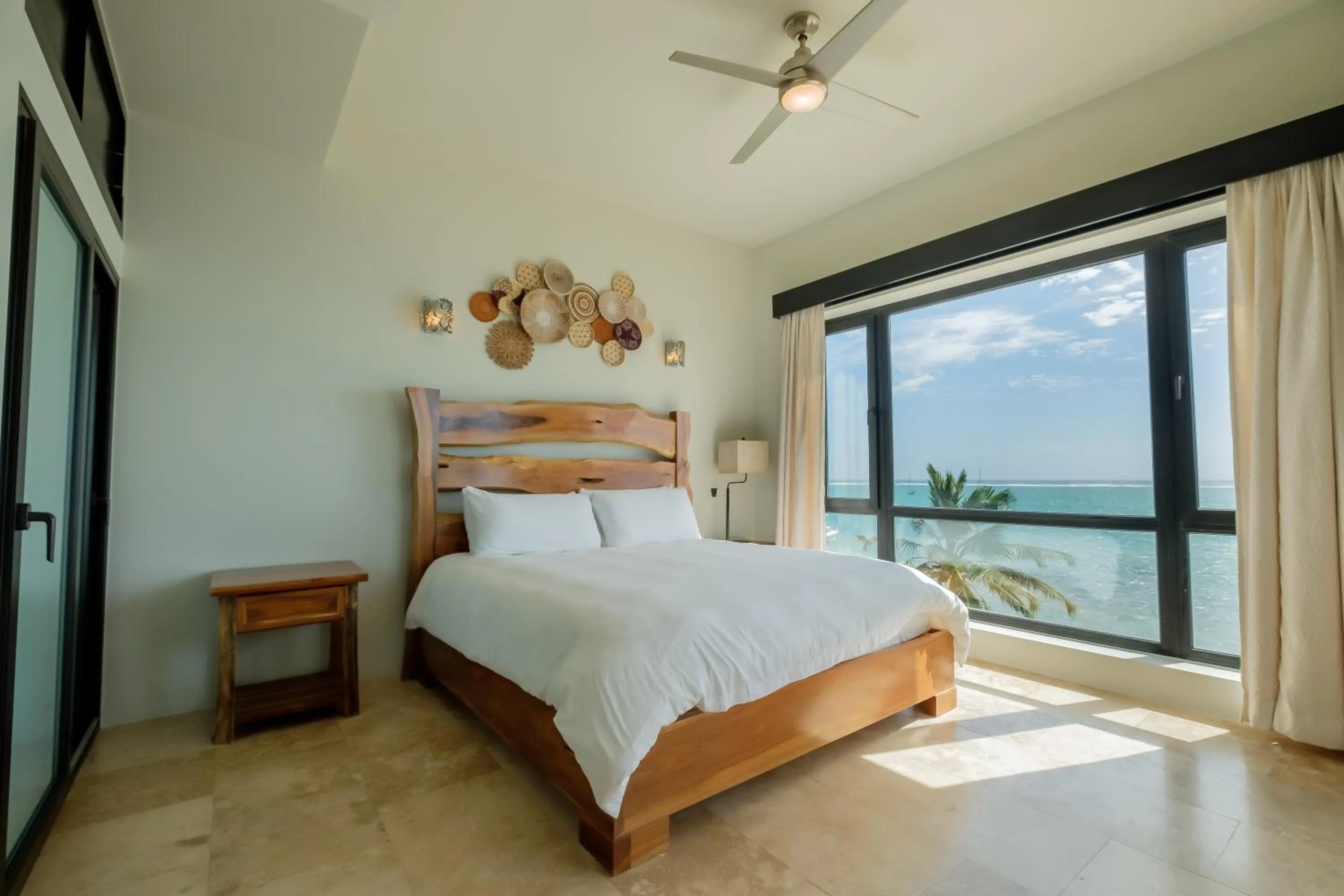 Bed in Diamante Beachfront Suites