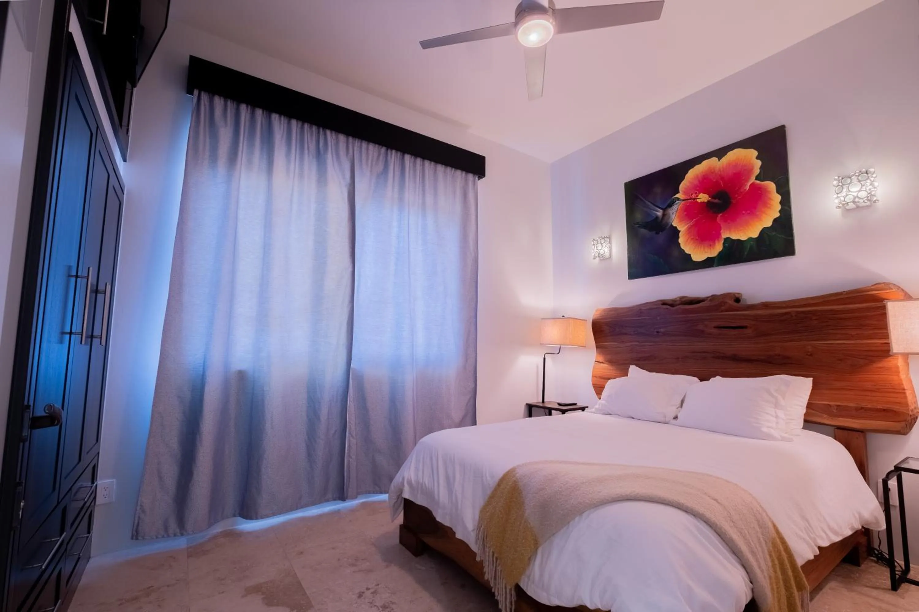 Bed in Diamante Beachfront Suites