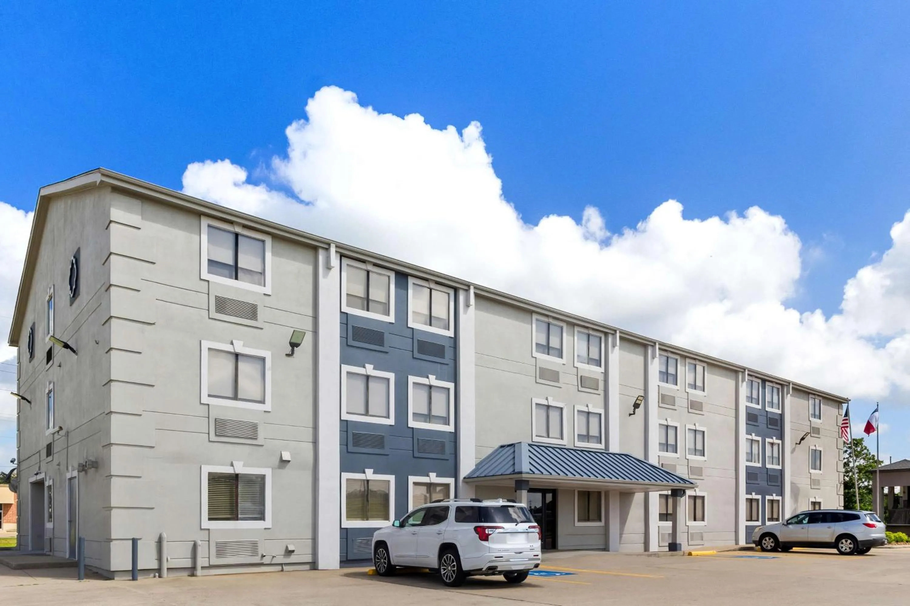 Property building in SureStay Hotel by Best Western Groves