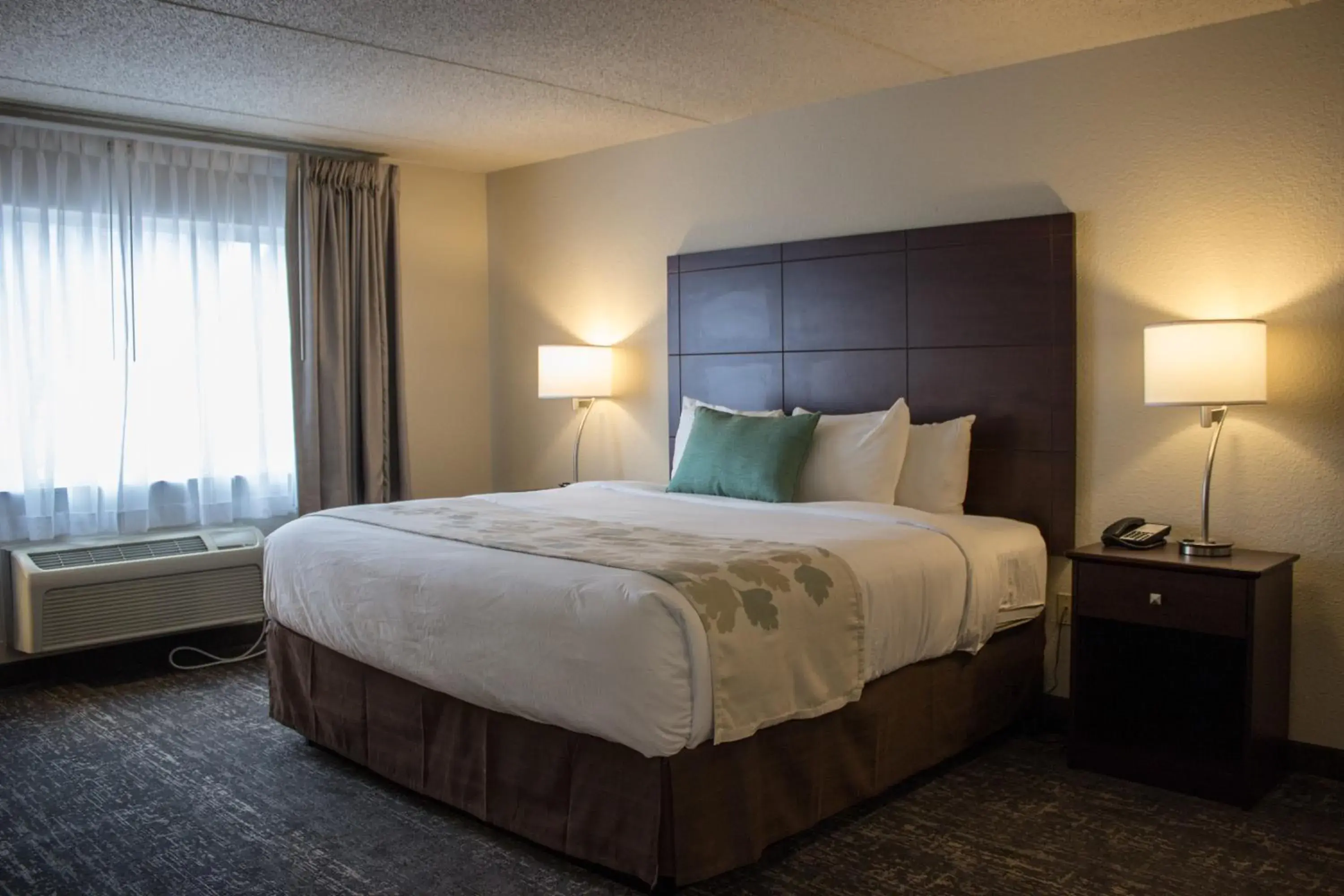 Bed in Cobblestone Suites - Oshkosh Bed in Cobblestone Suites - Oshkosh