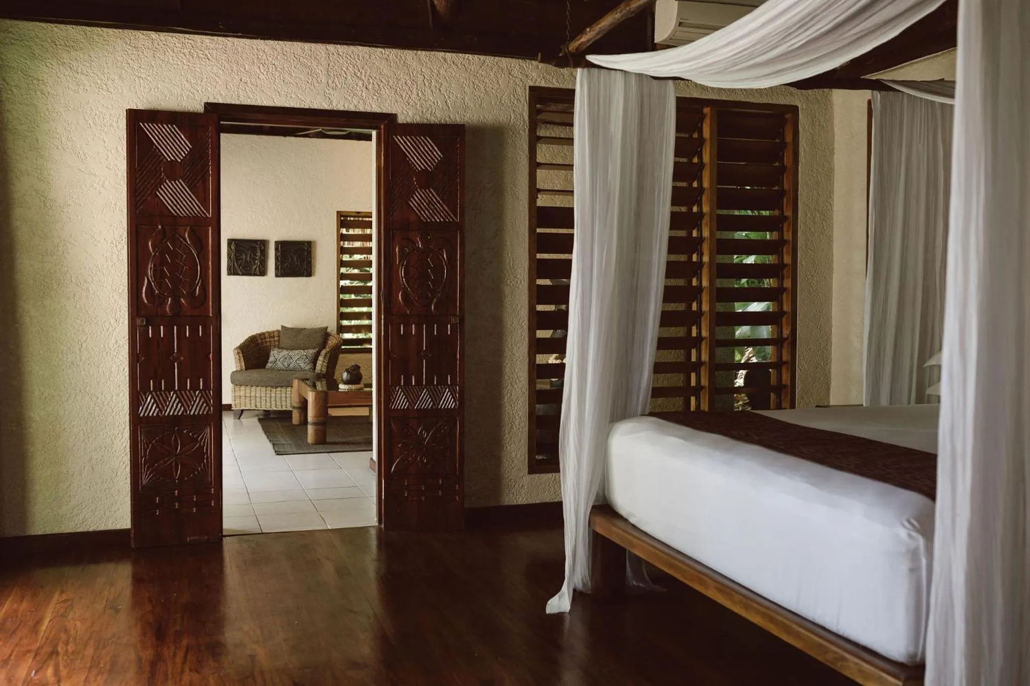 Bed in Tokoriki Island Resort Adults-Only