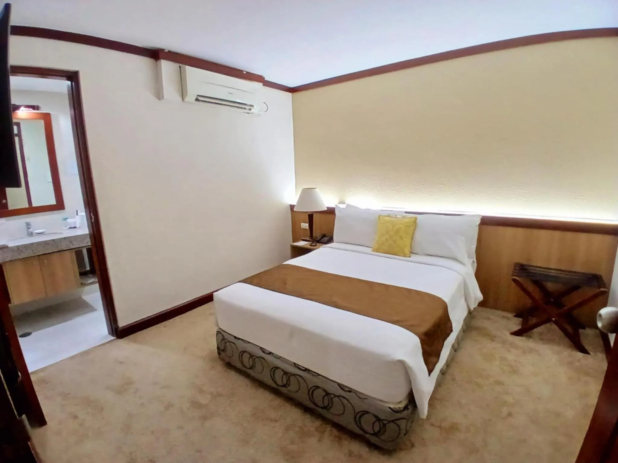 Bed in Dohera Hotel