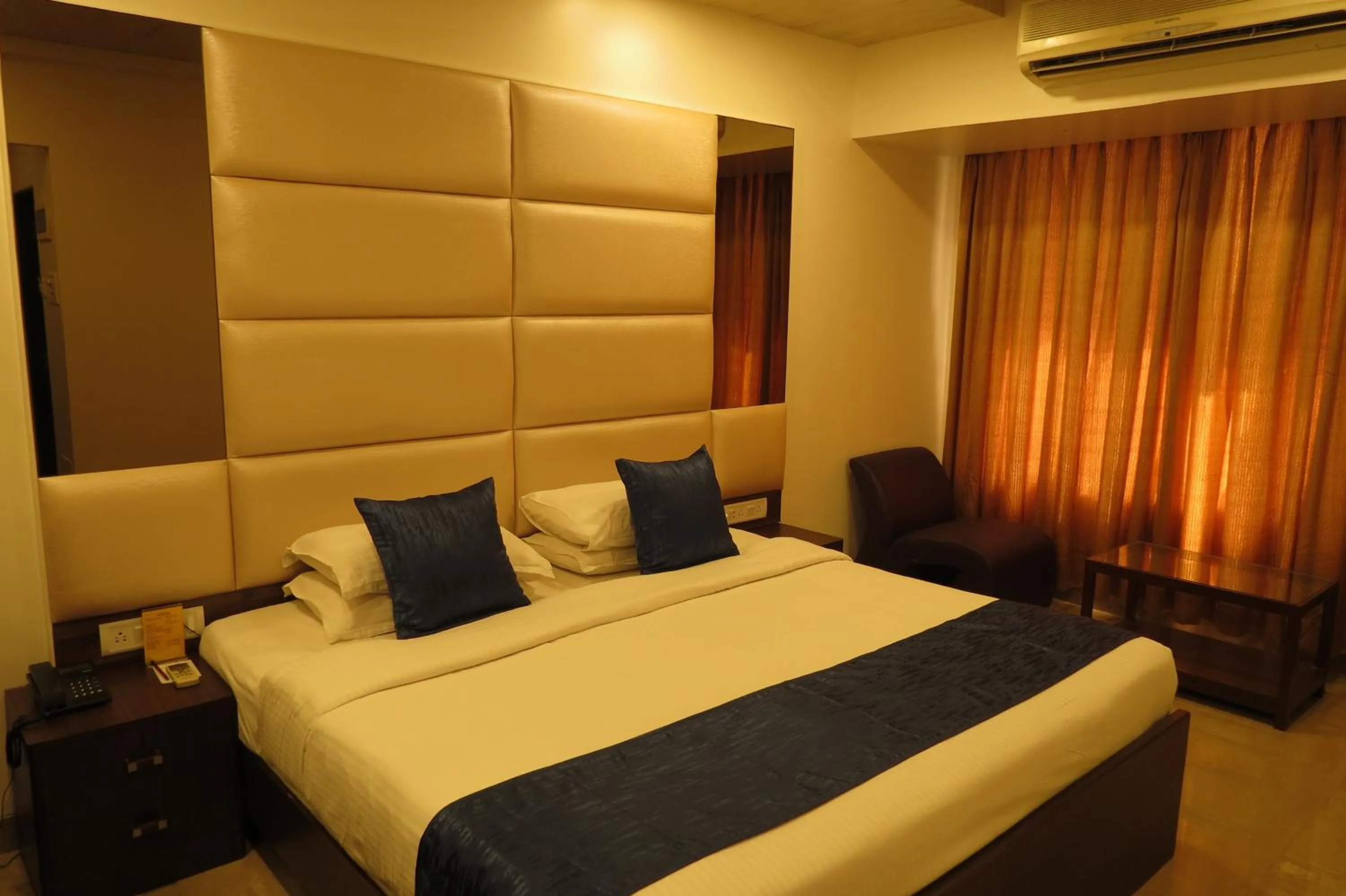 Bed in Jyoti Dwelling Hotel