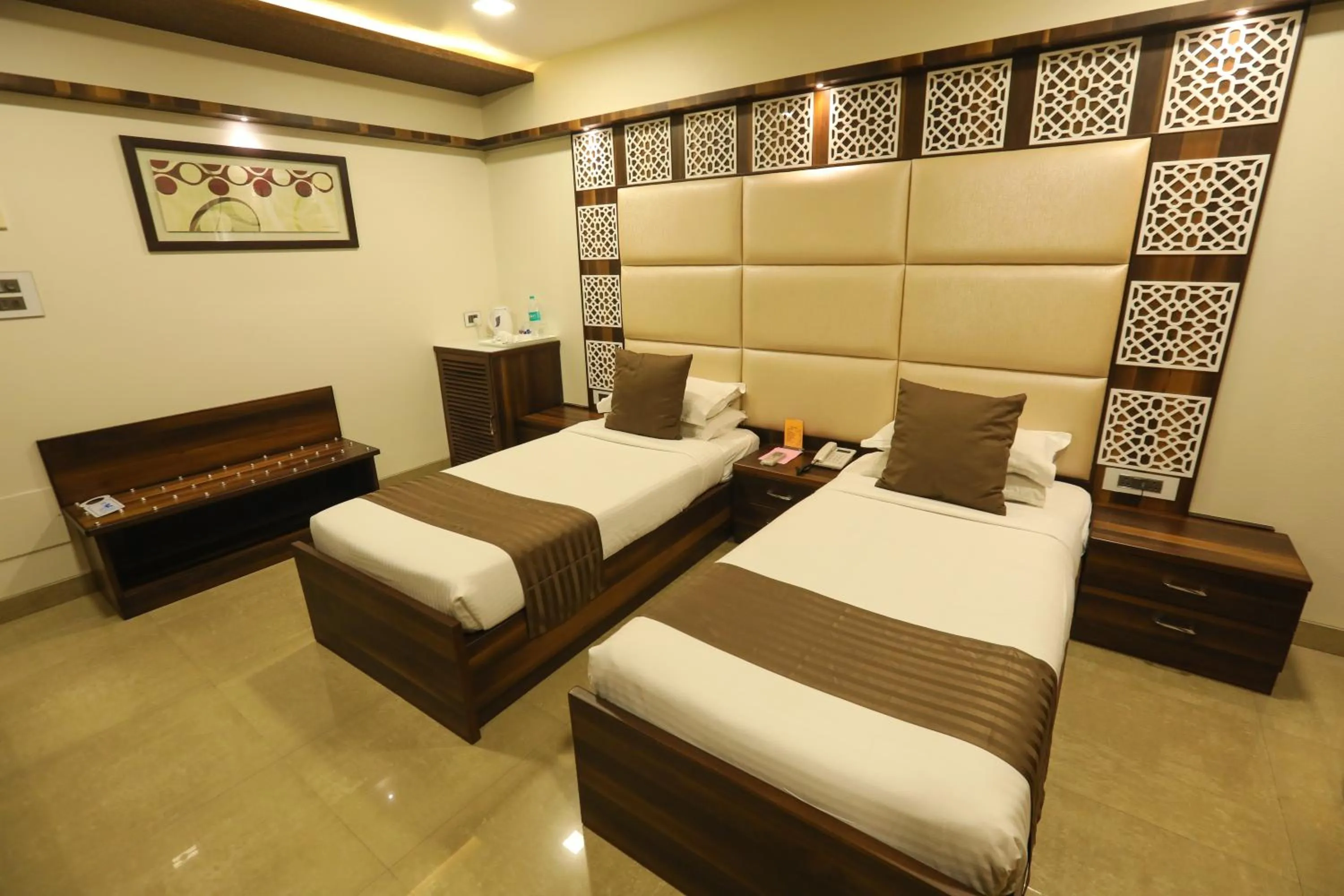Bed in Jyoti Dwelling Hotel