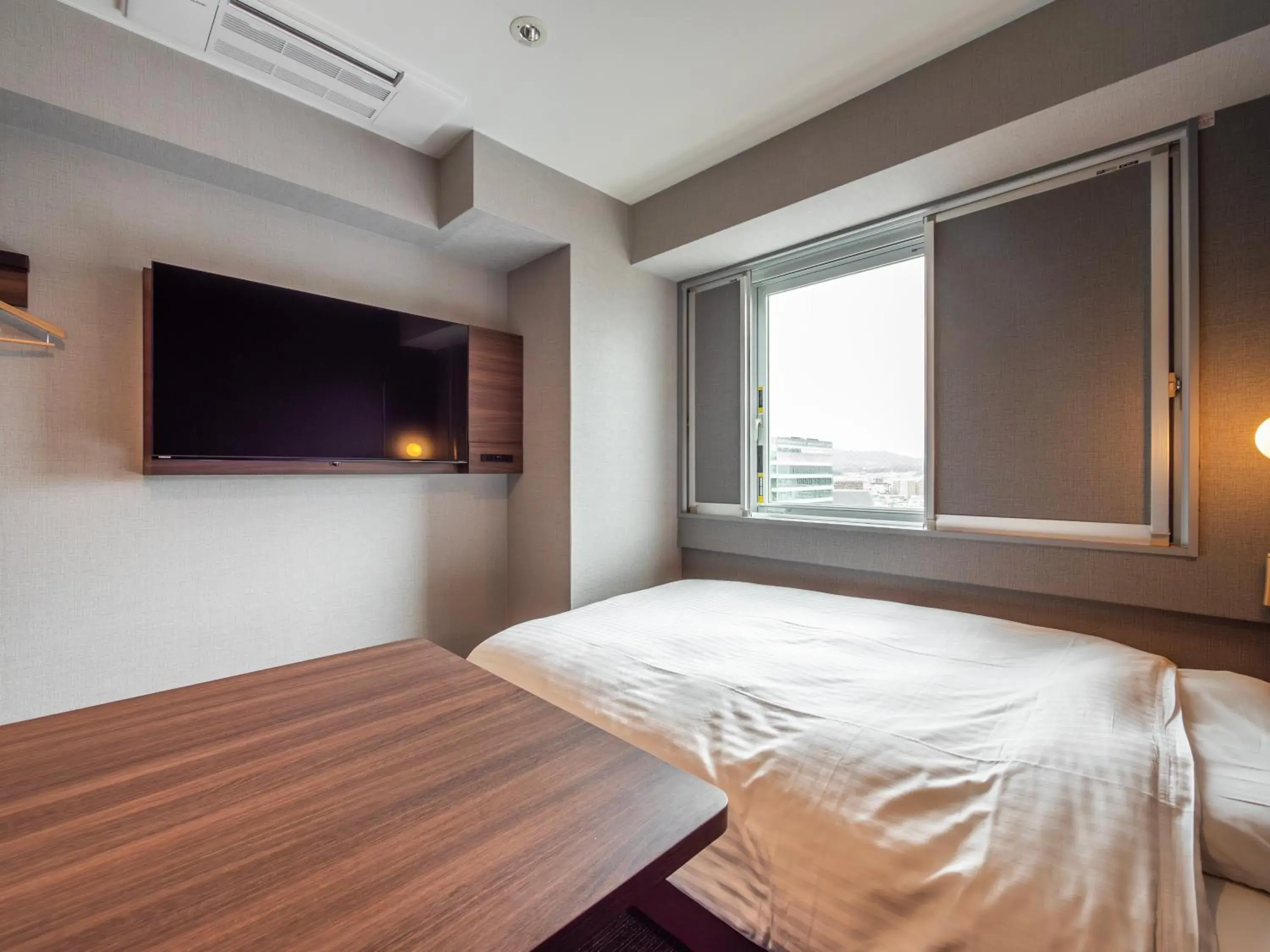 Photo of the whole room, Bed in Super Hotel Premier JR Nara Eki Photo of the whole room, Bed in Super Hotel Premier JR Nara Eki