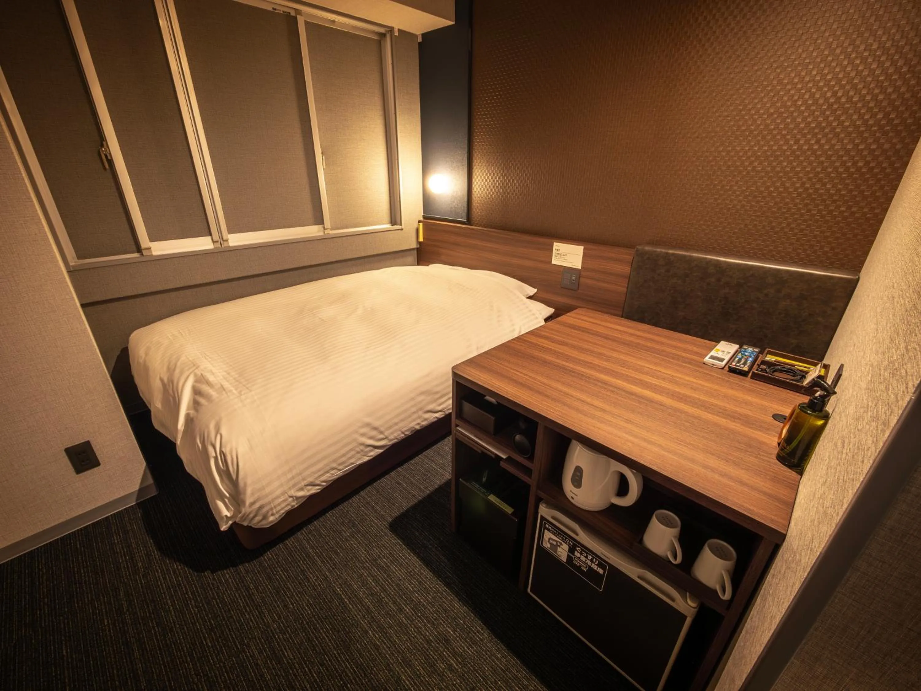 Bed in Super Hotel Premier JR Nara Eki