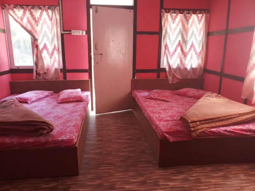 Bed in Reshi River Cottage Bed in Reshi River Cottage