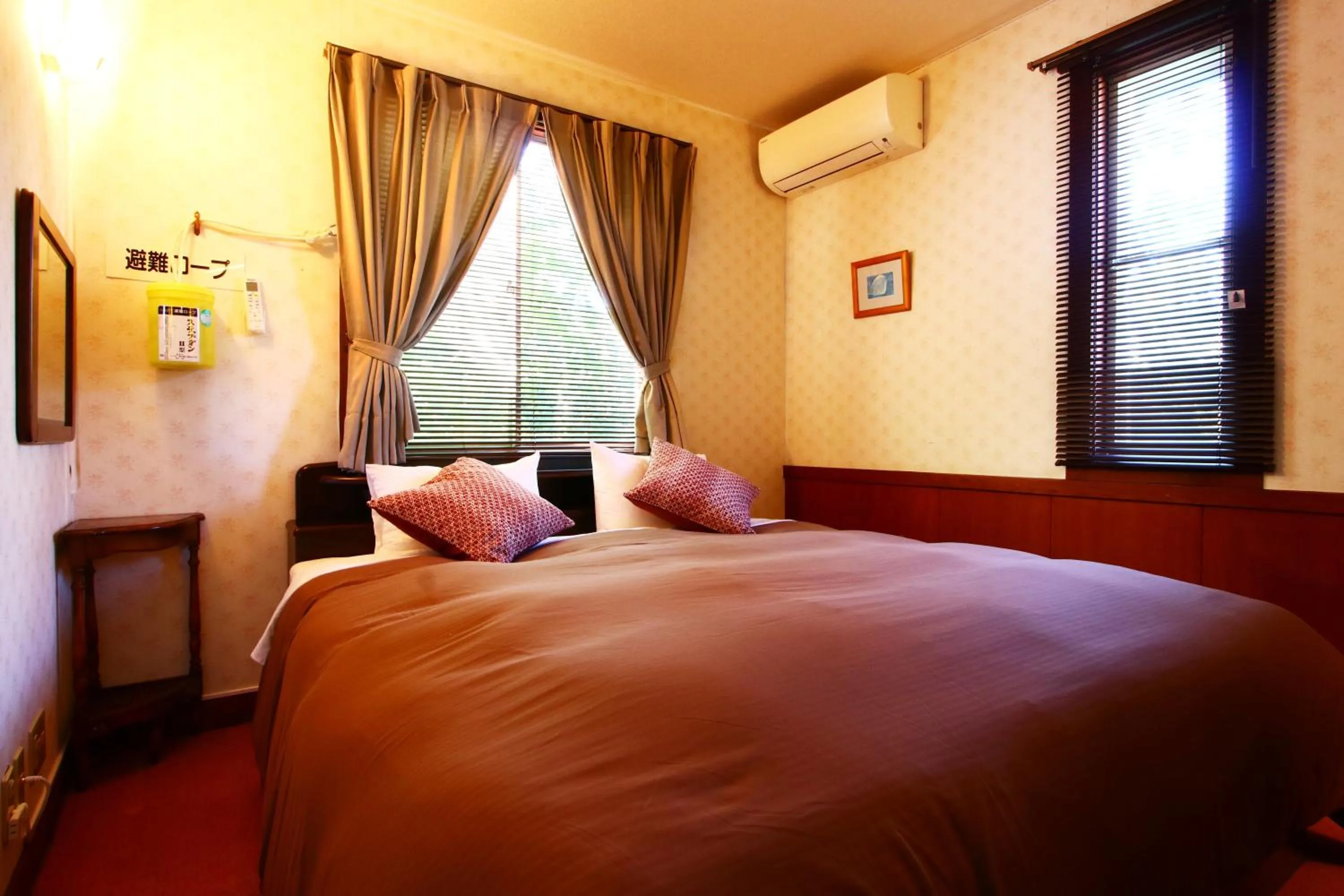 Photo of the whole room, Bed in IZUNA INN & SPA - the veggie delights