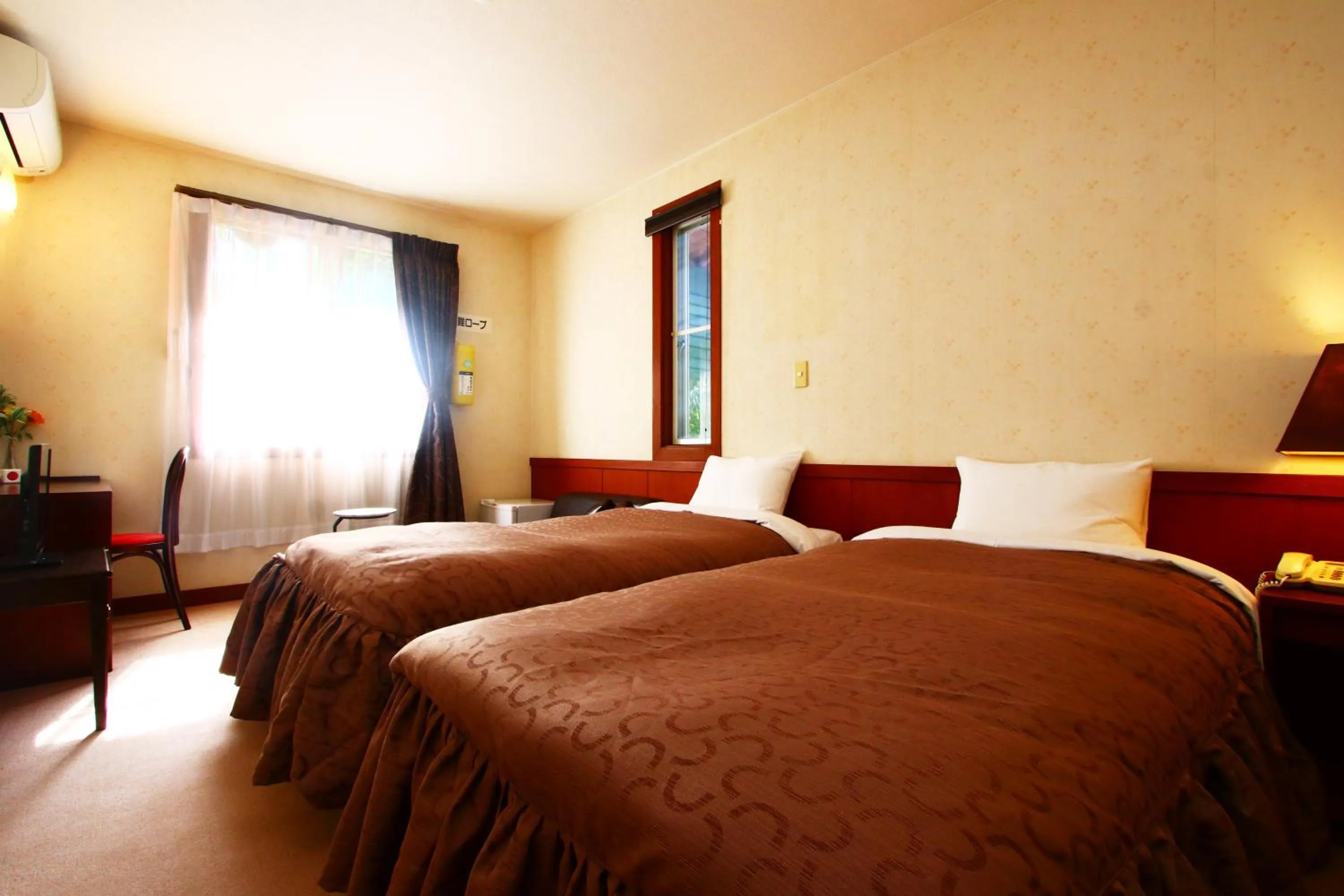 Photo of the whole room, Bed in IZUNA INN & SPA - the veggie delights