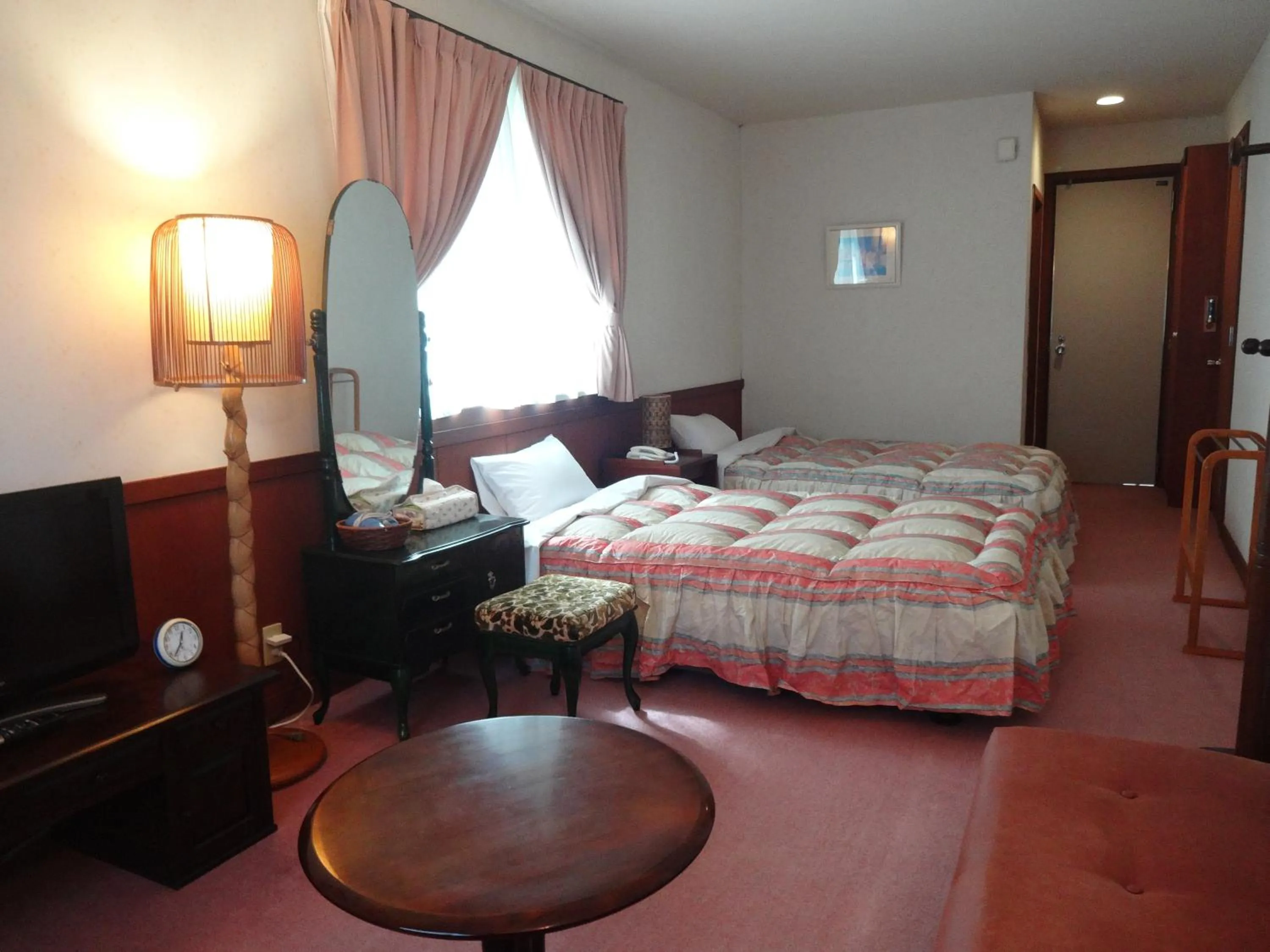 Bed in IZUNA INN & SPA - the veggie delights