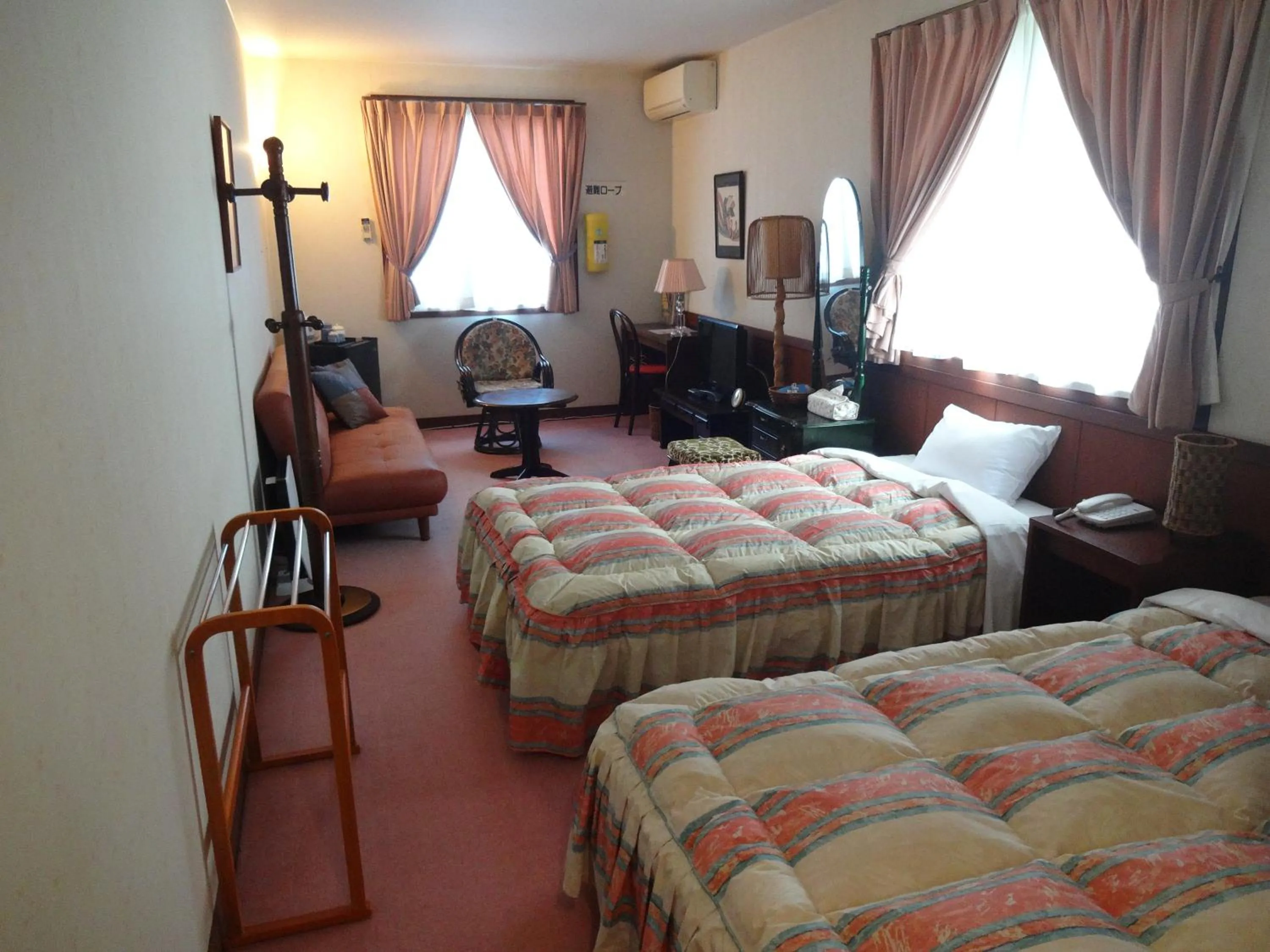 Bed in IZUNA INN & SPA - the veggie delights