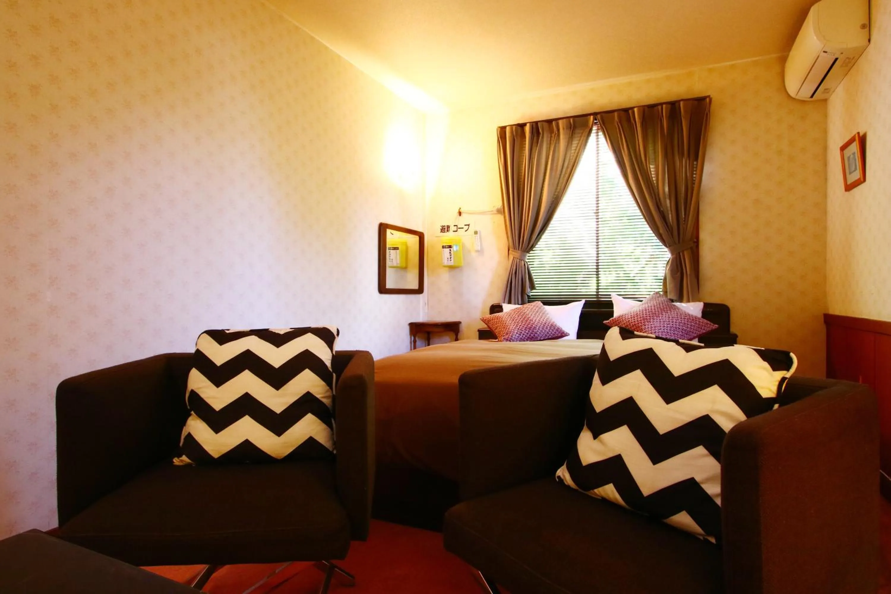 Bed in IZUNA INN & SPA - the veggie delights