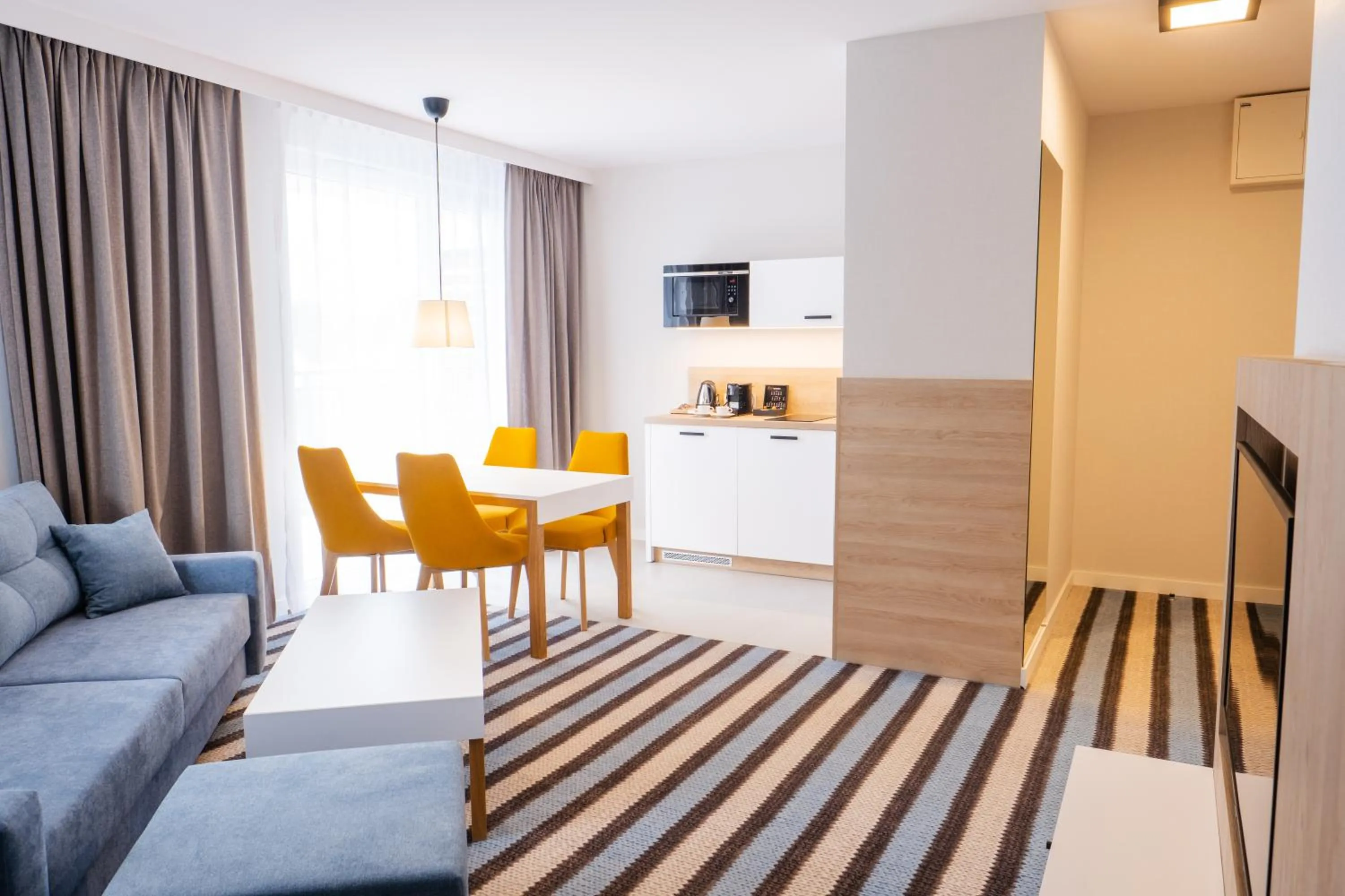 Living room in AQUA RESORT by Bel Mare