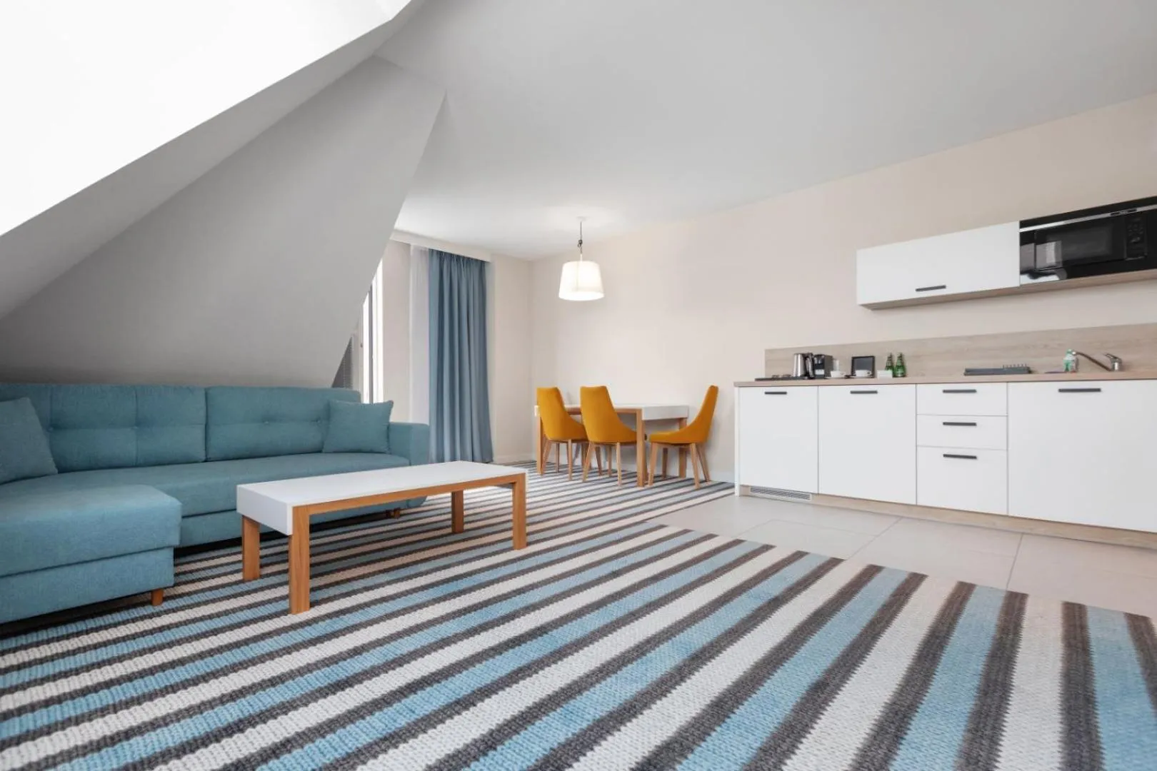 Living room in AQUA RESORT by Bel Mare